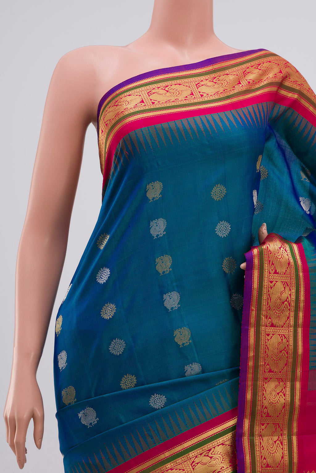 Border image of Blue Gadwal Silk Saree with Zari Butta on the body and Zari Border. 
