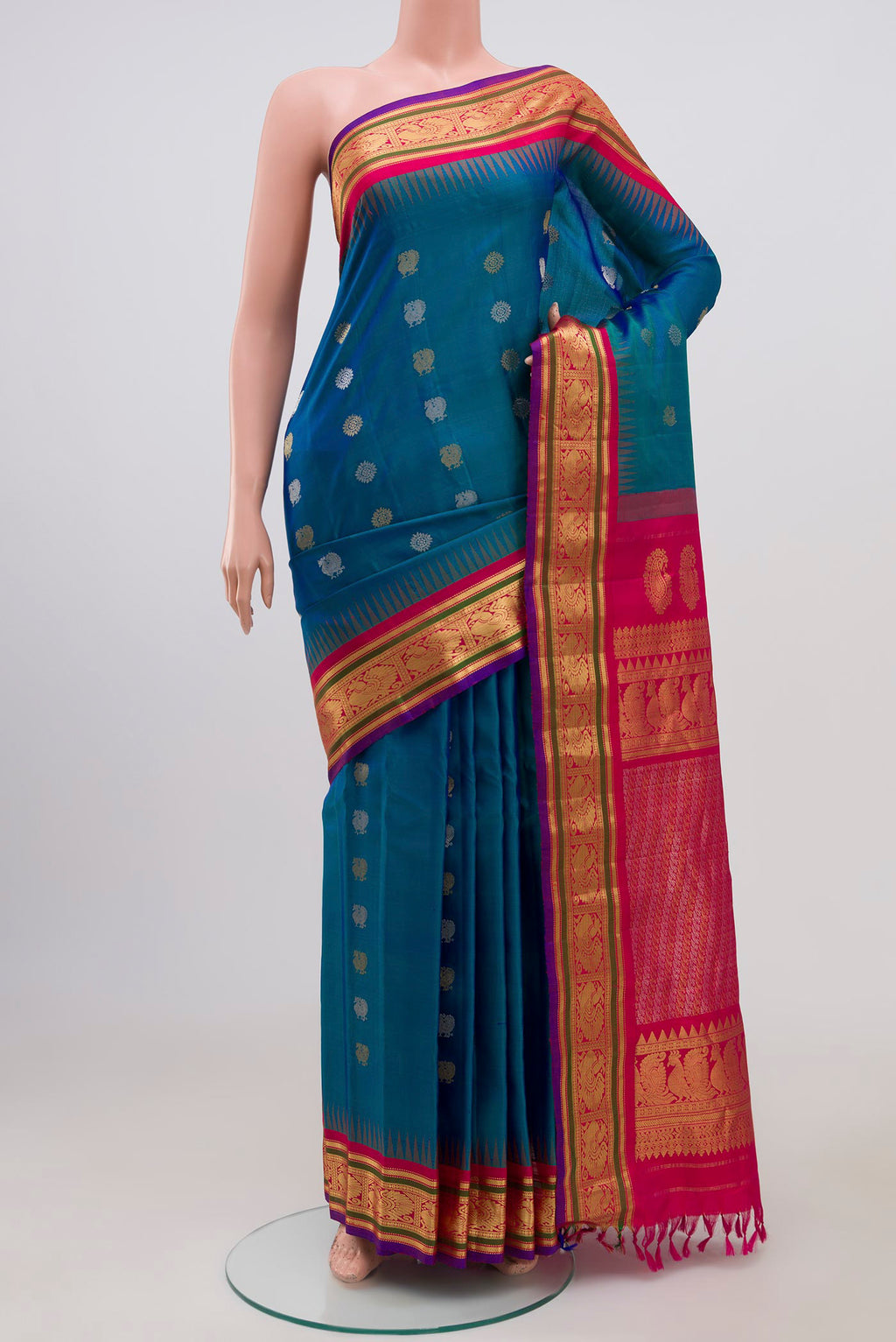 Blue Gadwal Silk Saree with Zari Butta on the body and Zari Border.  displayed on a mannequin