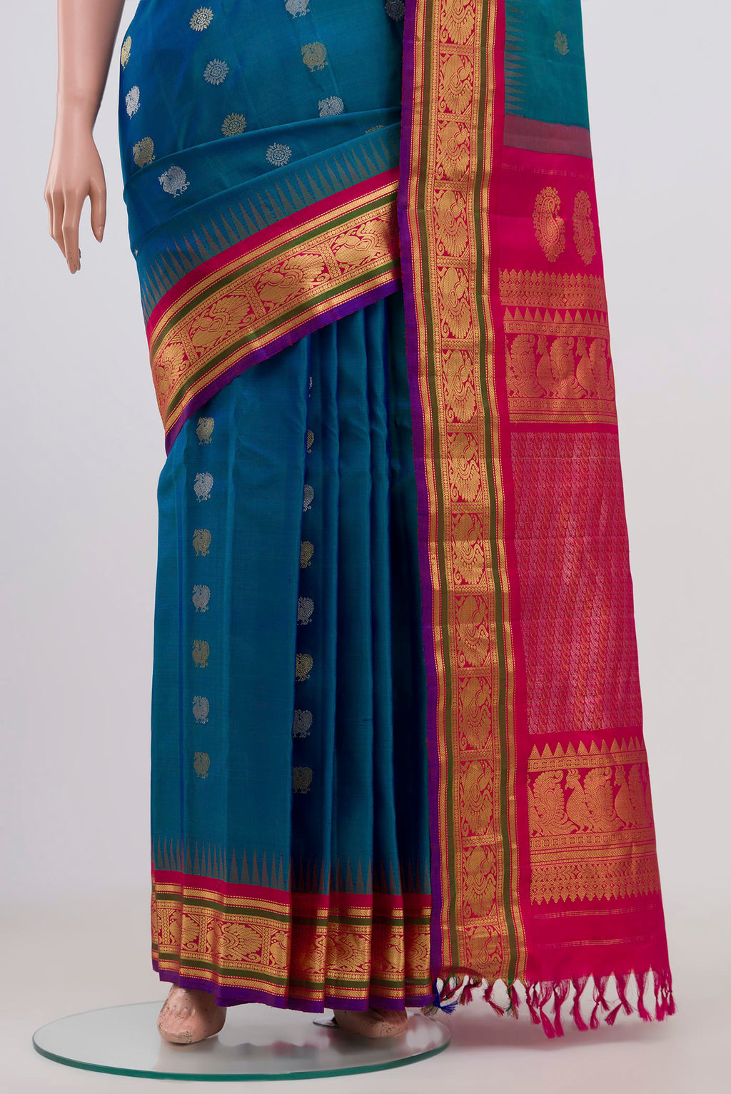 Pleats and pallu of Blue Gadwal Silk Saree with Zari Butta on the body and Zari Border. 