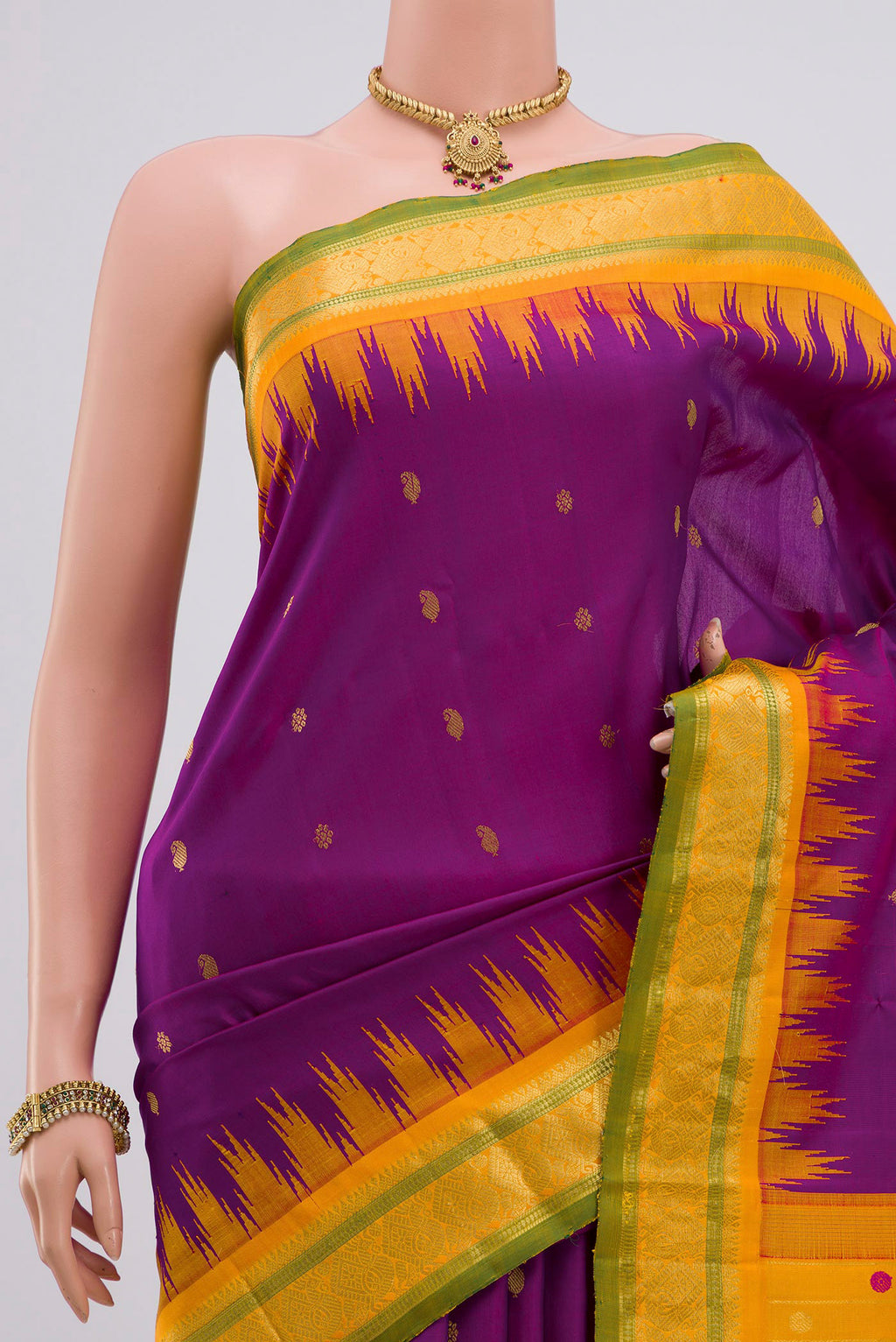 Border image of Purple Gadwal Silk Saree with Zari Butta on the body and Zari Border. 