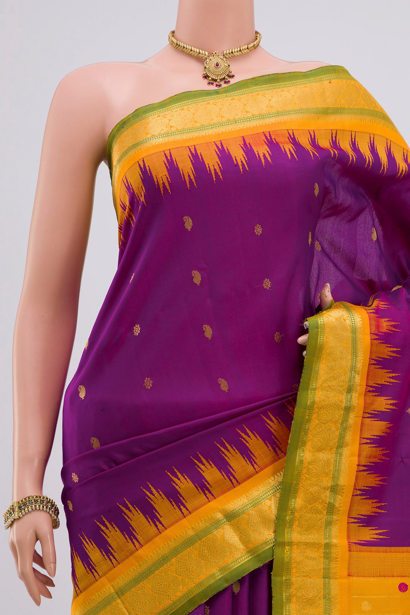 Border image of Purple Gadwal Silk Saree with Zari Butta on the body and Zari Border. 