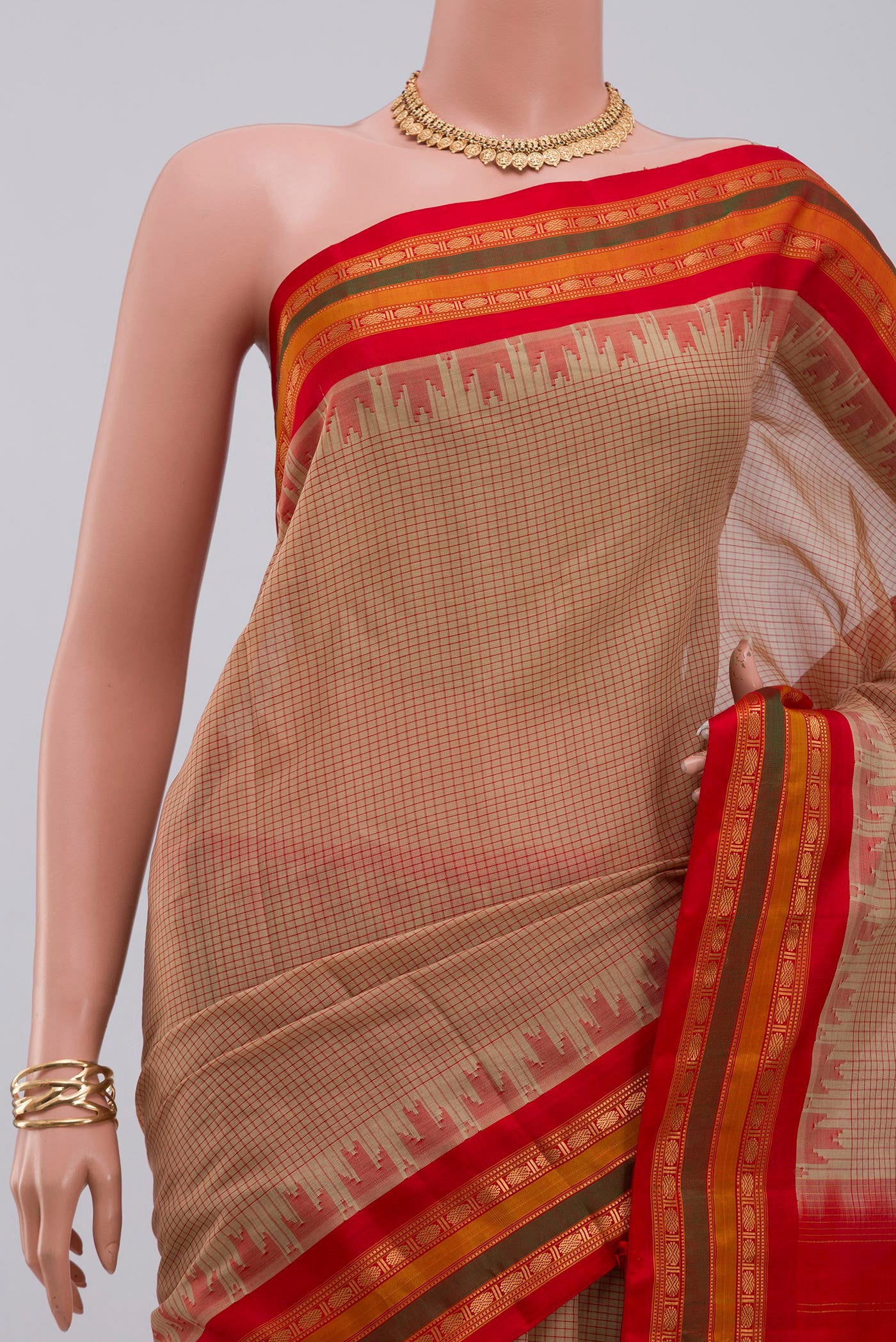 Border image of Cream Gadwal Silk Cotton Saree with Checked design on the body and Zari Border. 