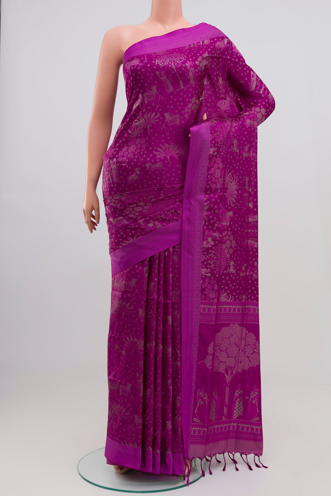 Purple Soft Silk Saree with Jacquard design on the body and Thread Border.  displayed on a mannequin