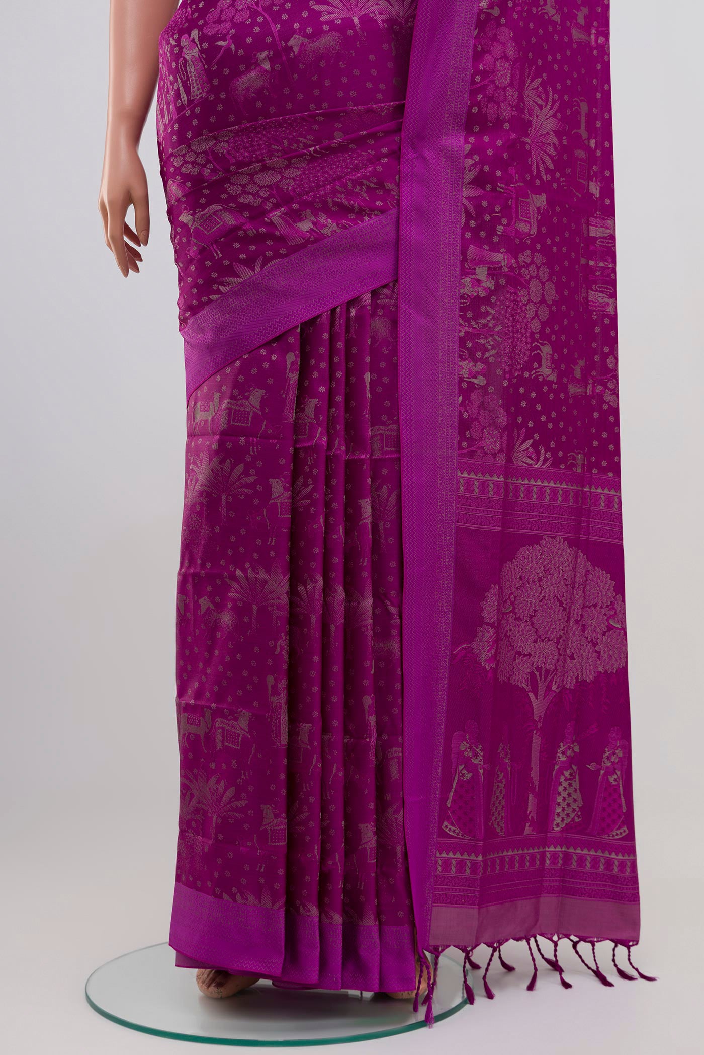 Pleats and pallu of Purple Soft Silk Saree with Jacquard design on the body and Thread Border. 