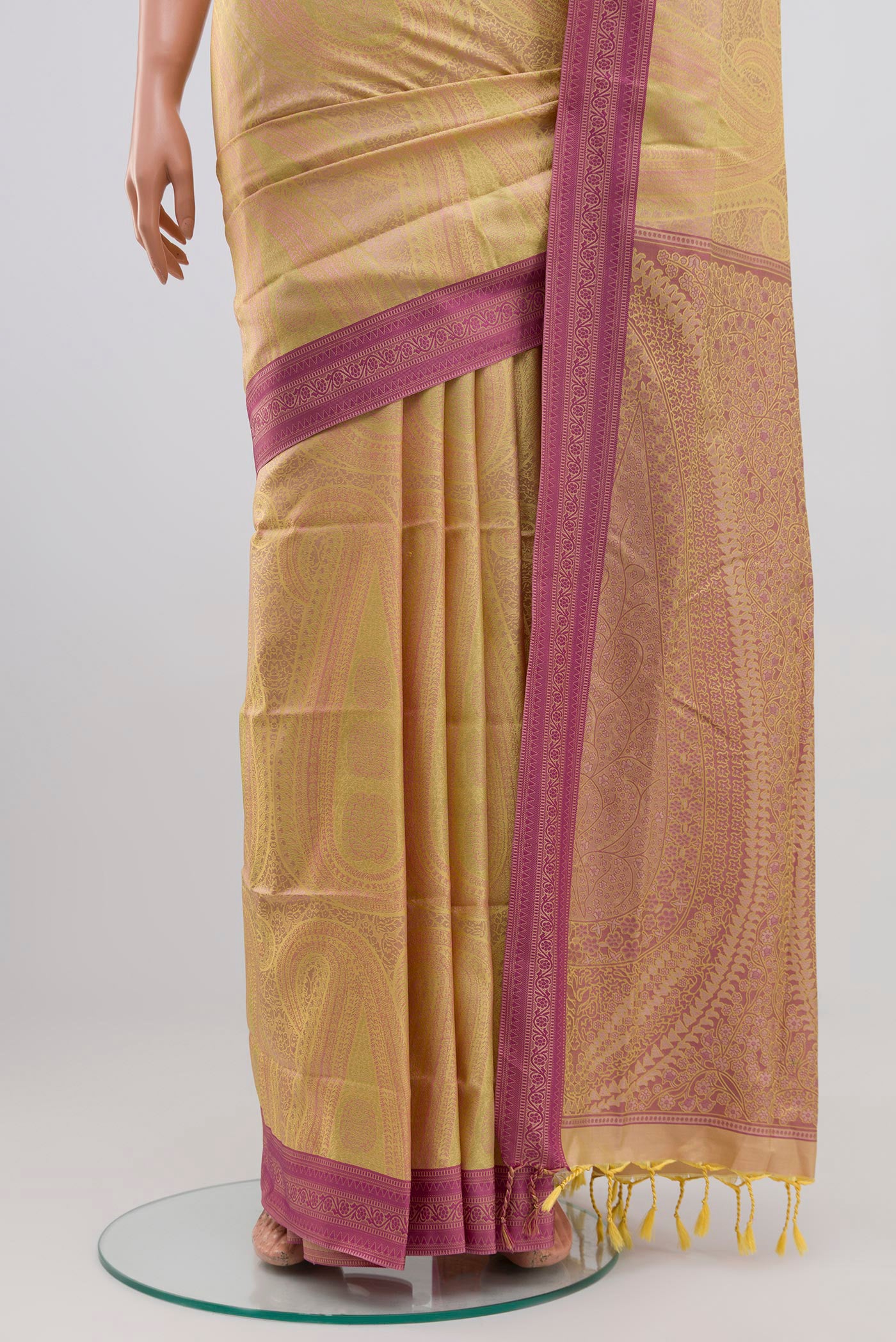 Pleats and pallu of Yellow Soft Silk Saree with Jacquard design on the body and Thread Border. 
