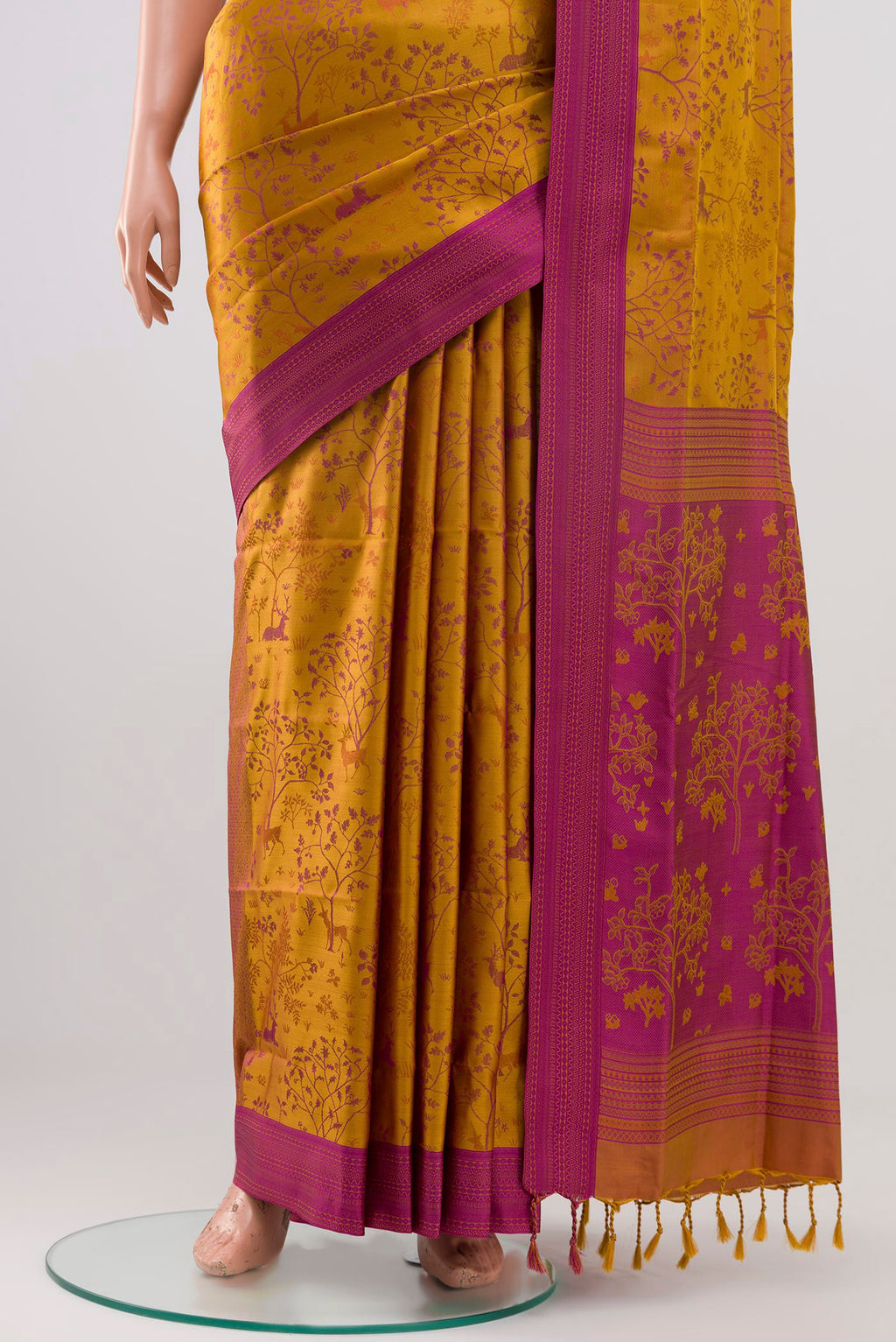 Pleats and pallu of Mustard Soft Silk Saree with Jacquard design on the body and Thread Border. 