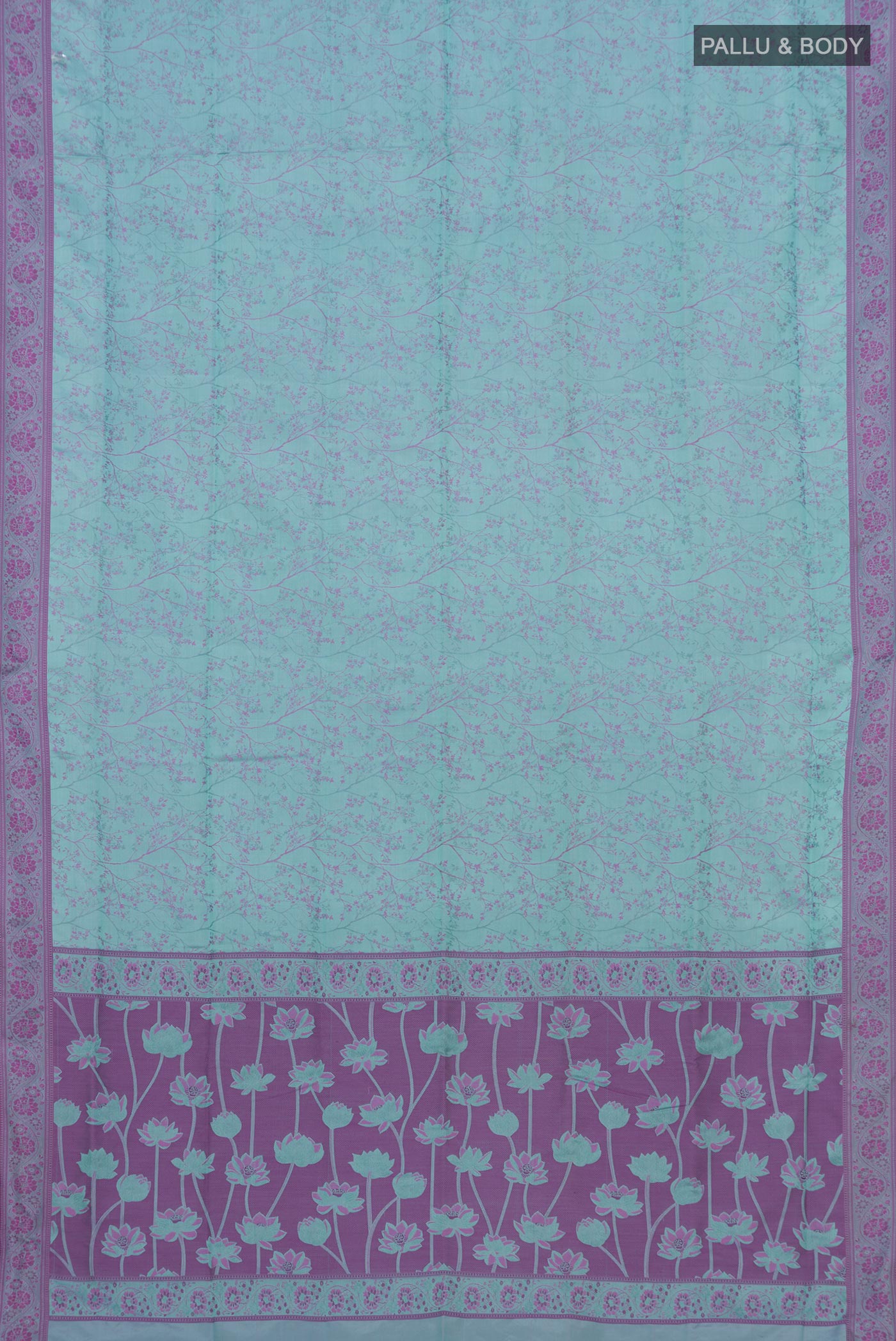 Flat view of Blue Soft Silk Saree with Jacquard design on the body and Thread Border. 