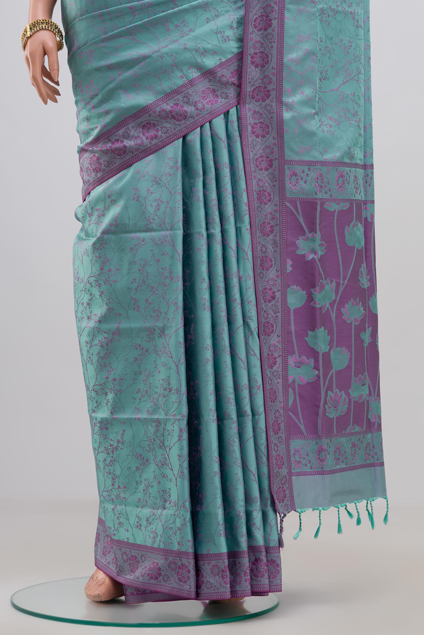 Pleats and pallu of Blue Soft Silk Saree with Jacquard design on the body and Thread Border. 