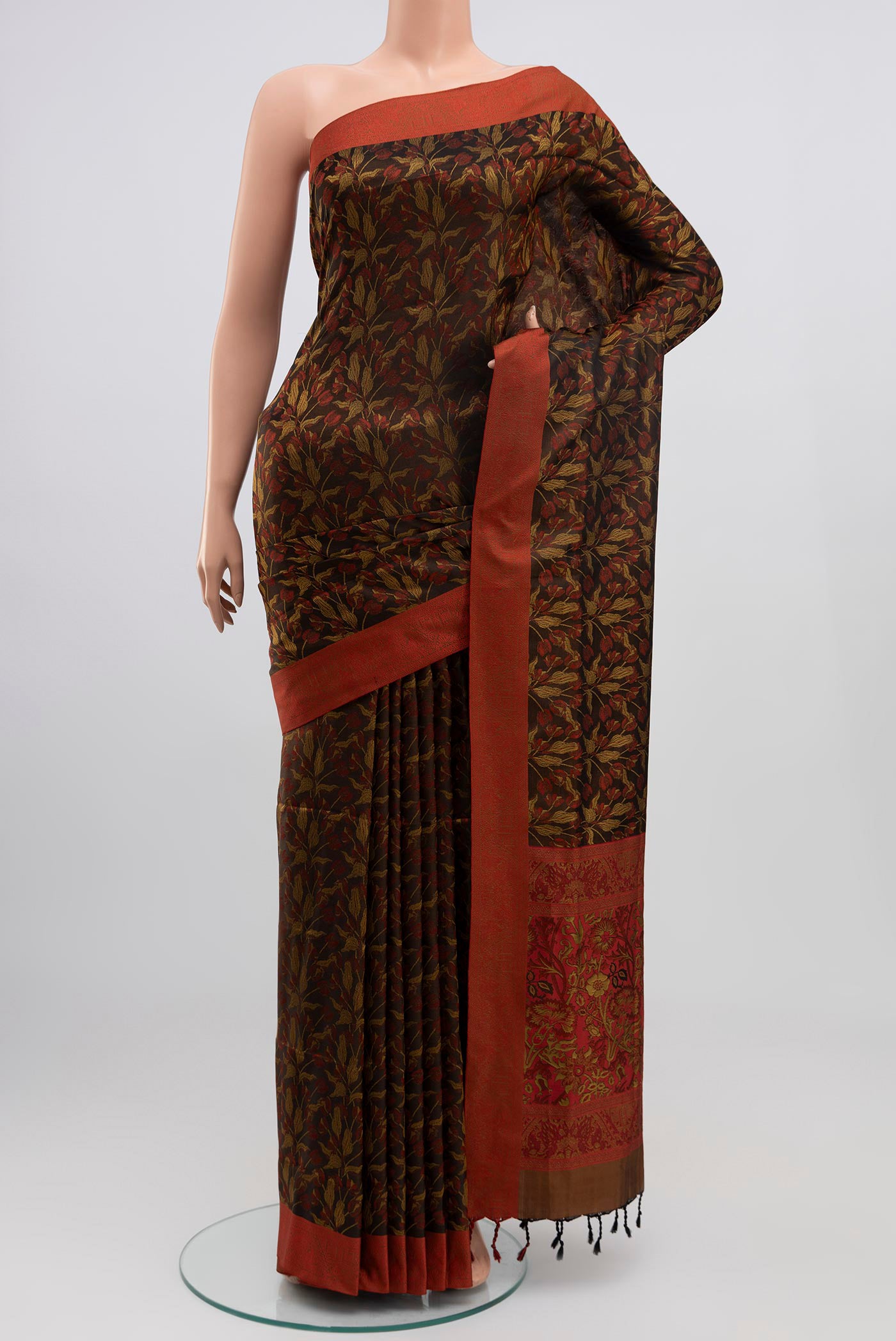 Brown Soft Silk Saree with Jacquard design on the body and Thread Border.  displayed on a mannequin