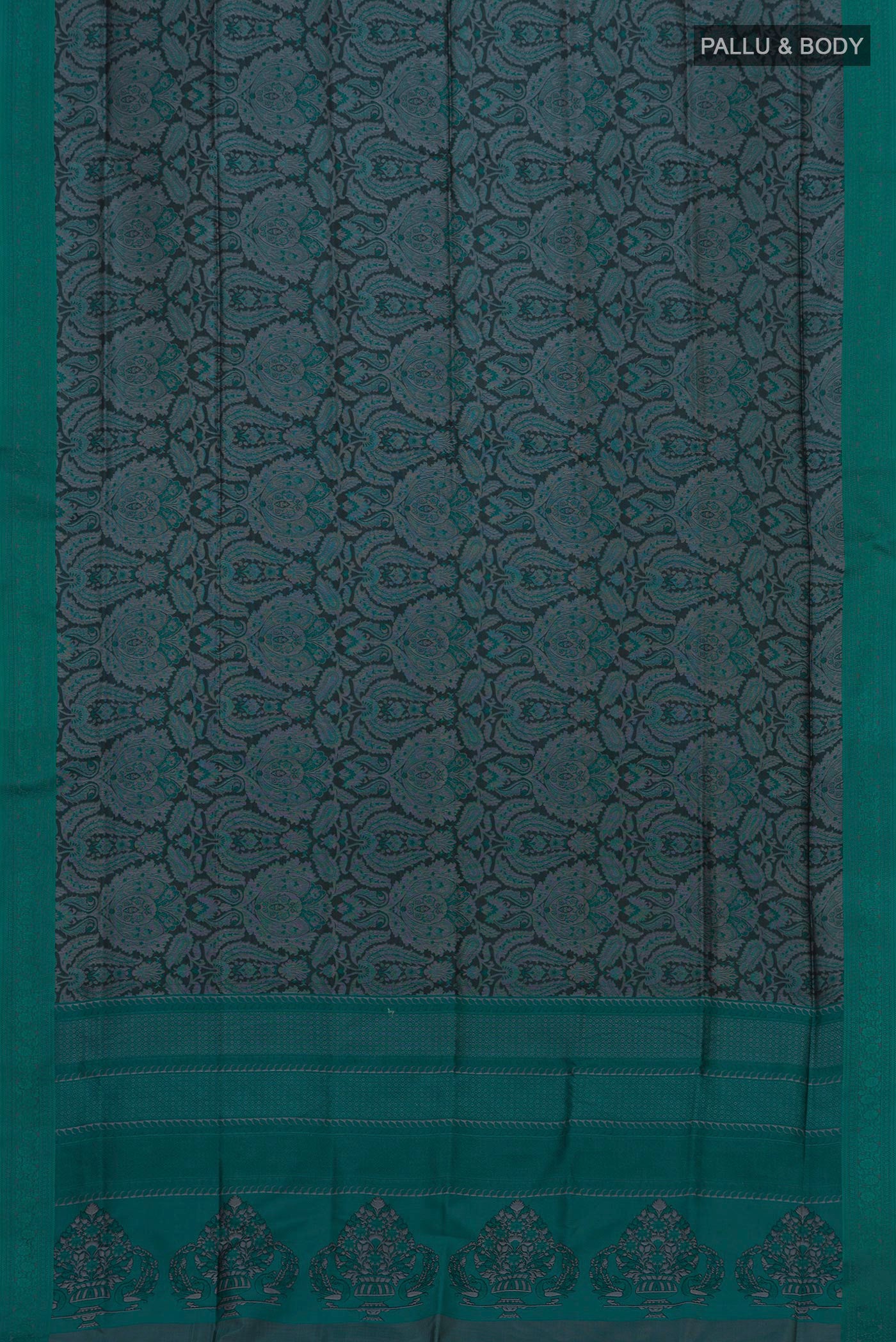 Flat view of Black Soft Silk Saree with Jacquard design on the body and Thread Border. 