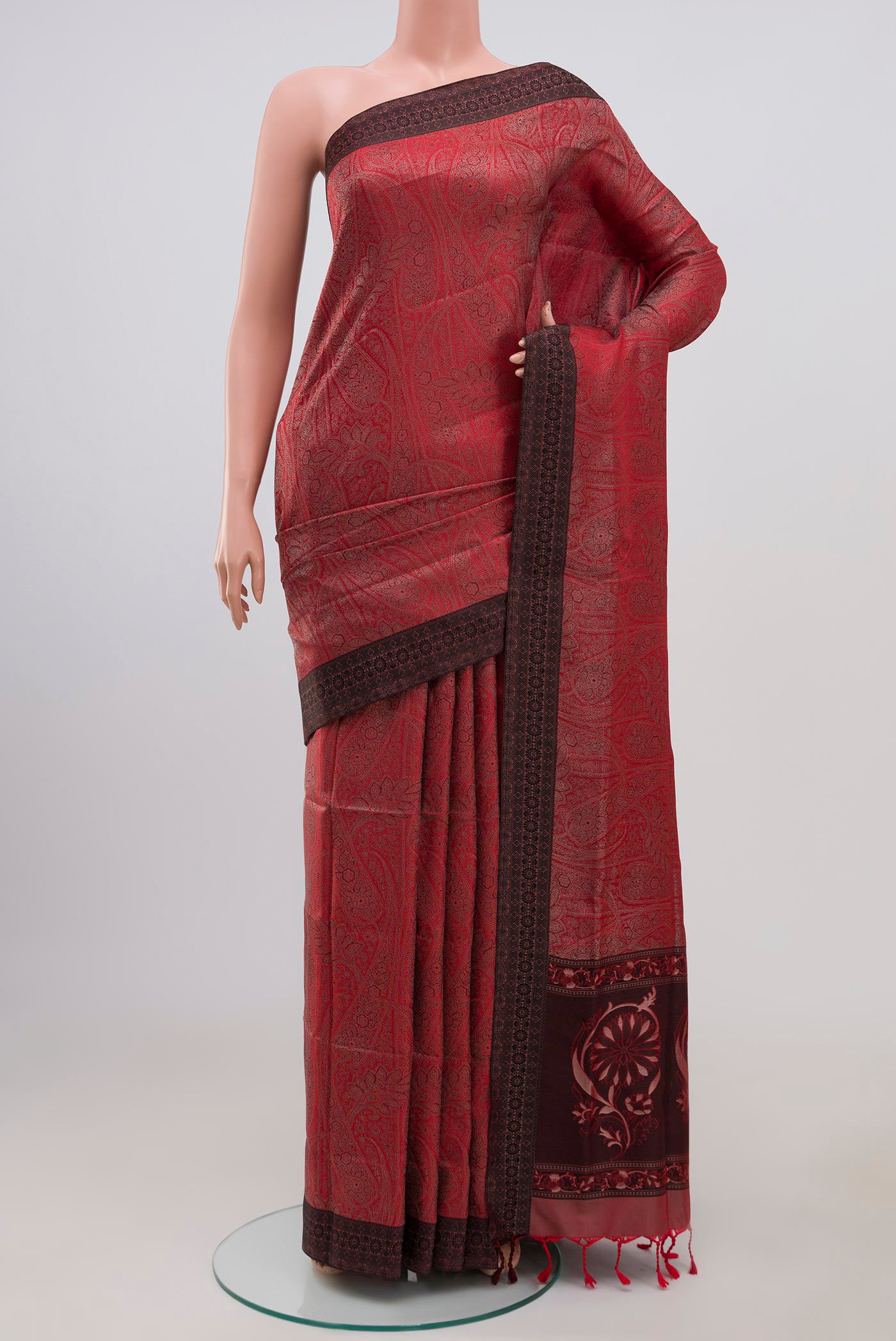 Red Soft Silk Saree with Jacquard design on the body and Thread Border.  displayed on a mannequin