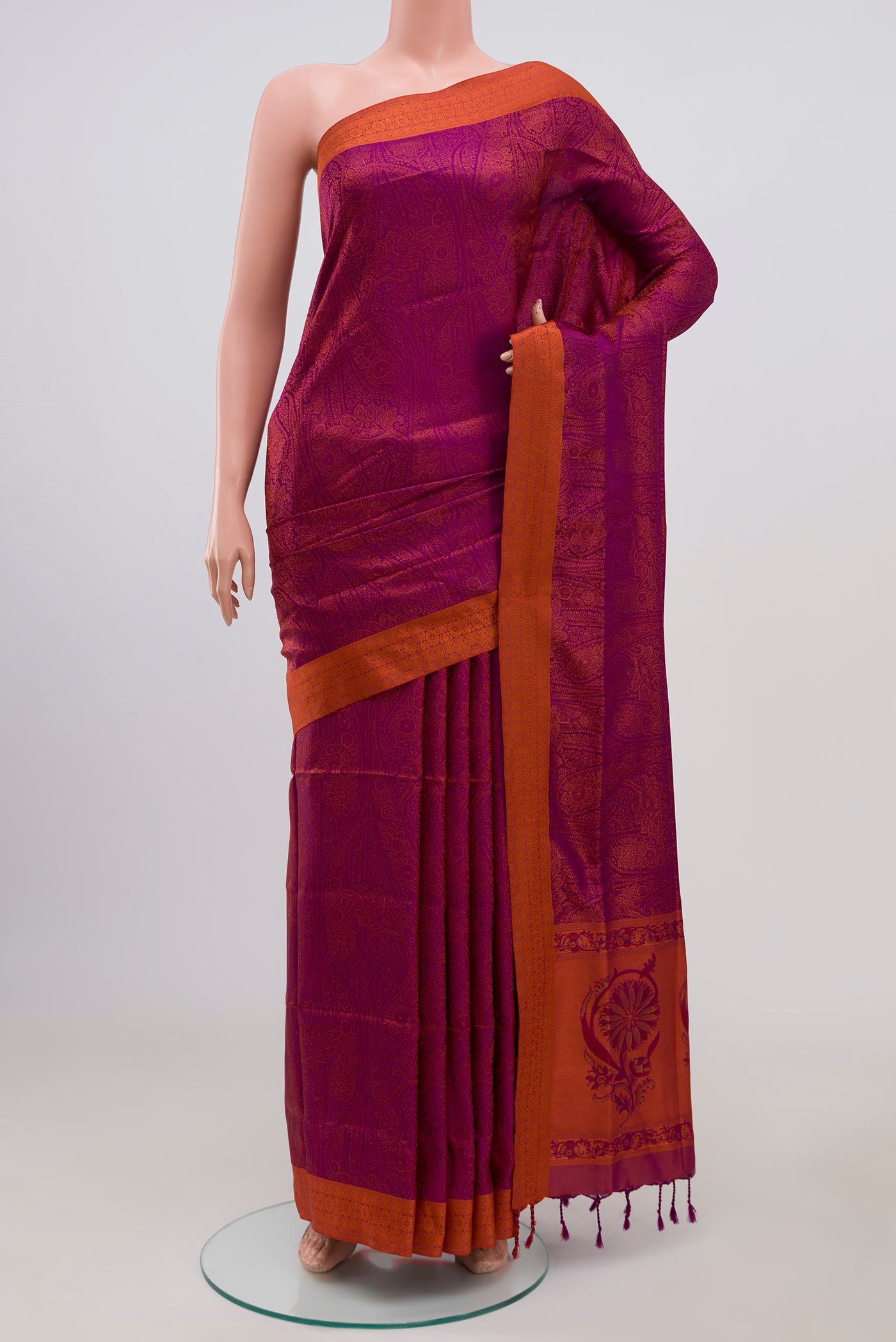 Purple Soft Silk Saree with Jacquard design on the body and Thread Border.  displayed on a mannequin