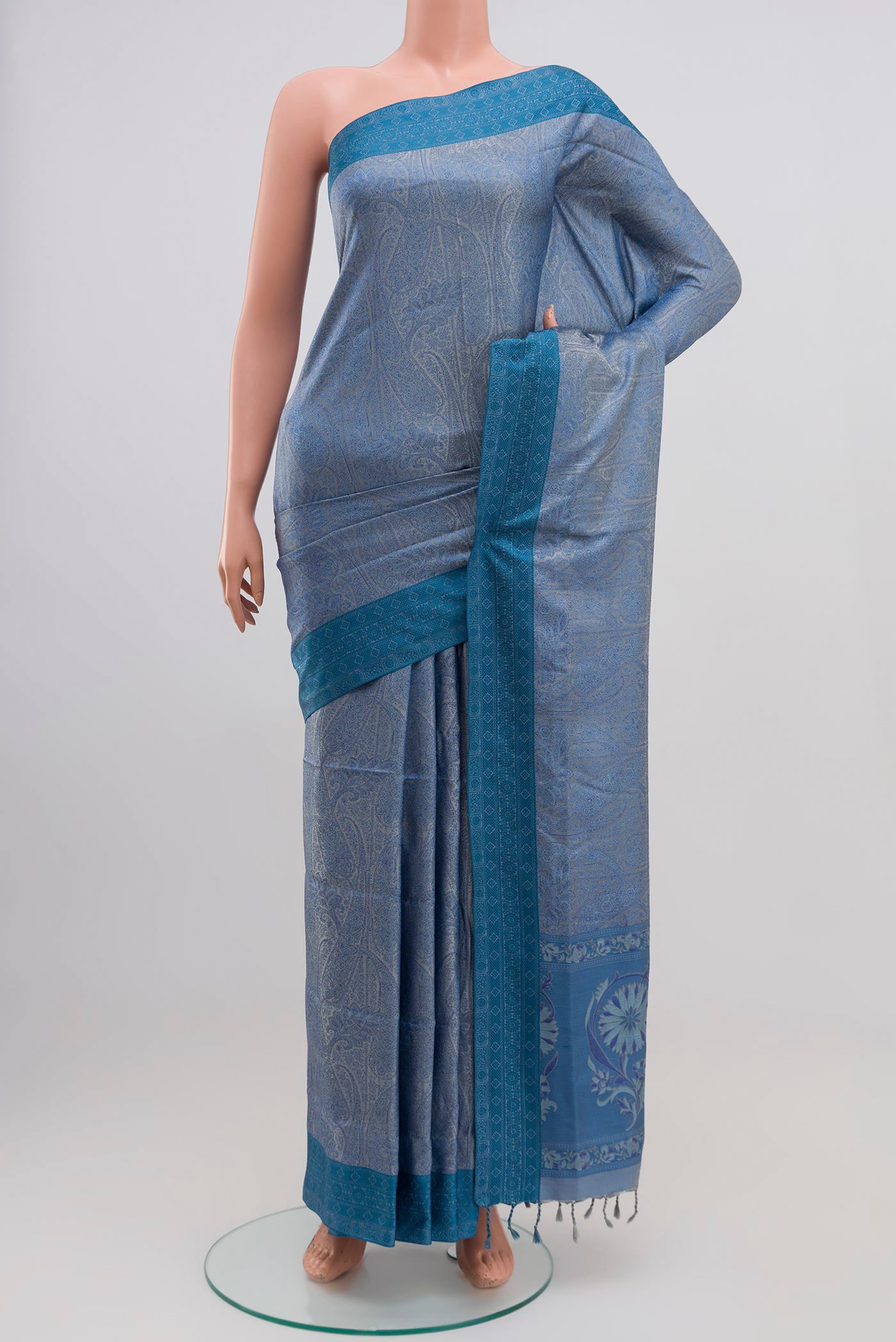 Blue Soft Silk Saree with Jacquard design on the body and Thread Border.  displayed on a mannequin