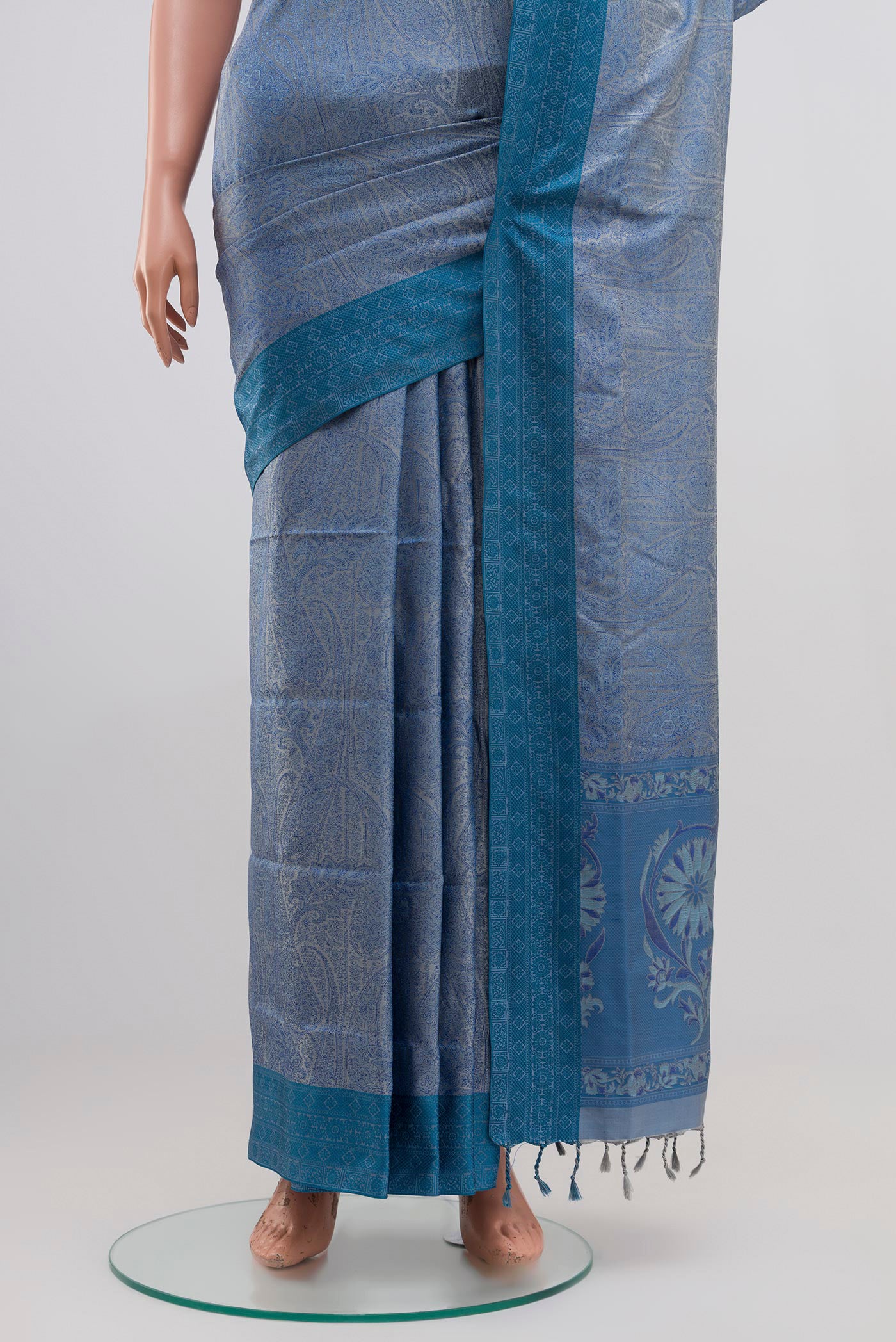 Pleats and pallu of Blue Soft Silk Saree with Jacquard design on the body and Thread Border. 
