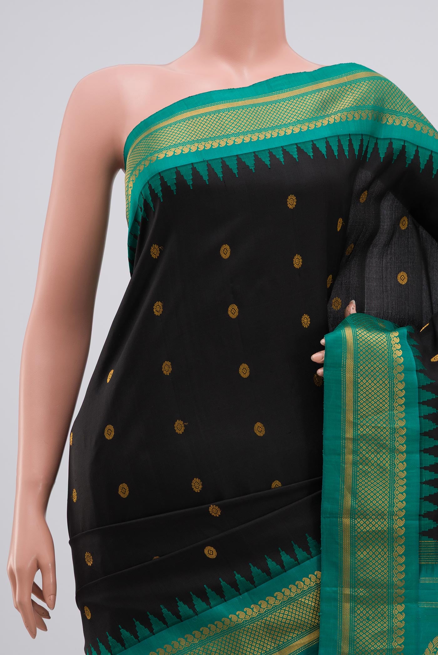 Border image of Black Gadwal Silk Saree with Zari Butta on the body and Zari Border. 