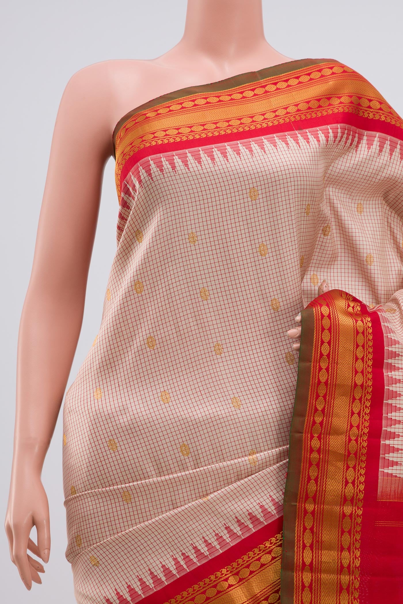Border image of Cream Gadwal Silk Saree with Zari Butta on the body and Zari Border. 