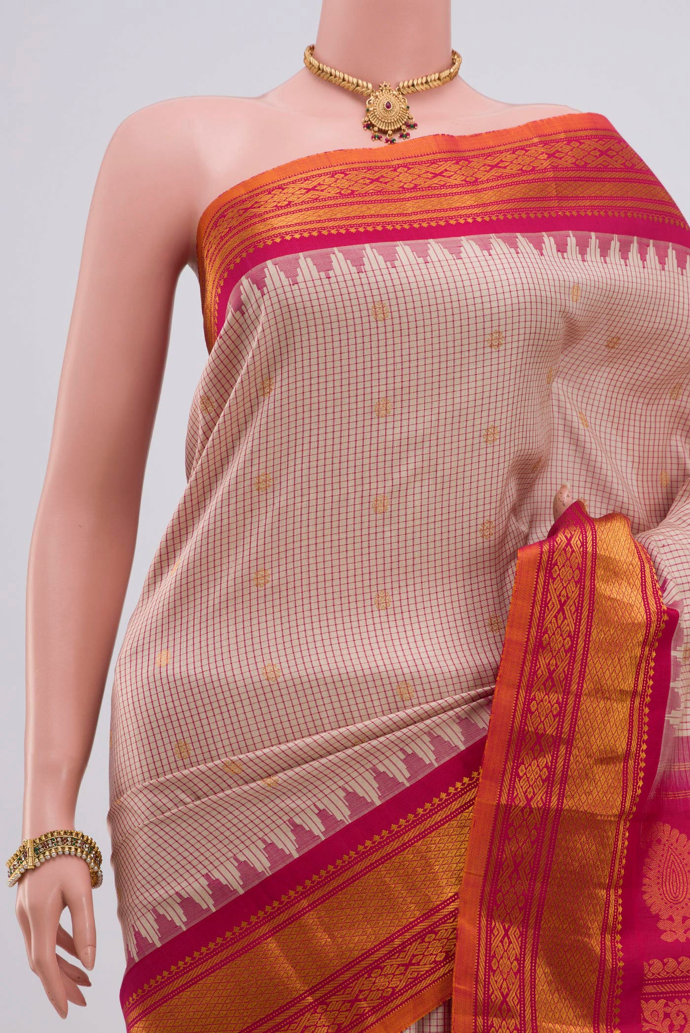 Border image of Cream Gadwal Silk Saree with Checked design on the body and Zari Border. 