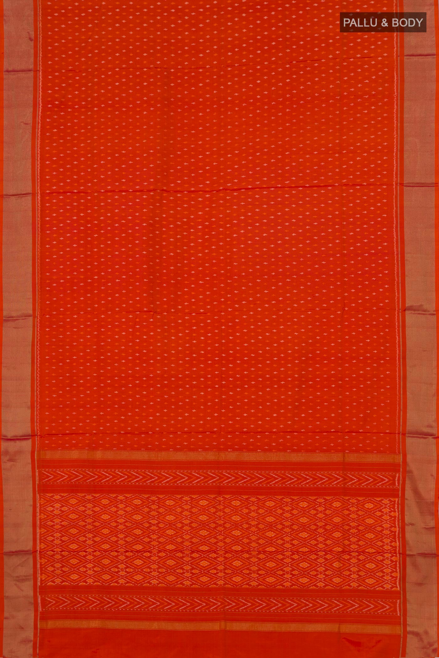 Flat view of Orange Pochampally Silk Saree with Ikat design on the body and Zari Border. 
