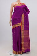 Pure Silk Pure Zari Purple Kanjivaram Saree with Zari Butta on the body and Zari Border.  displayed on a mannequin