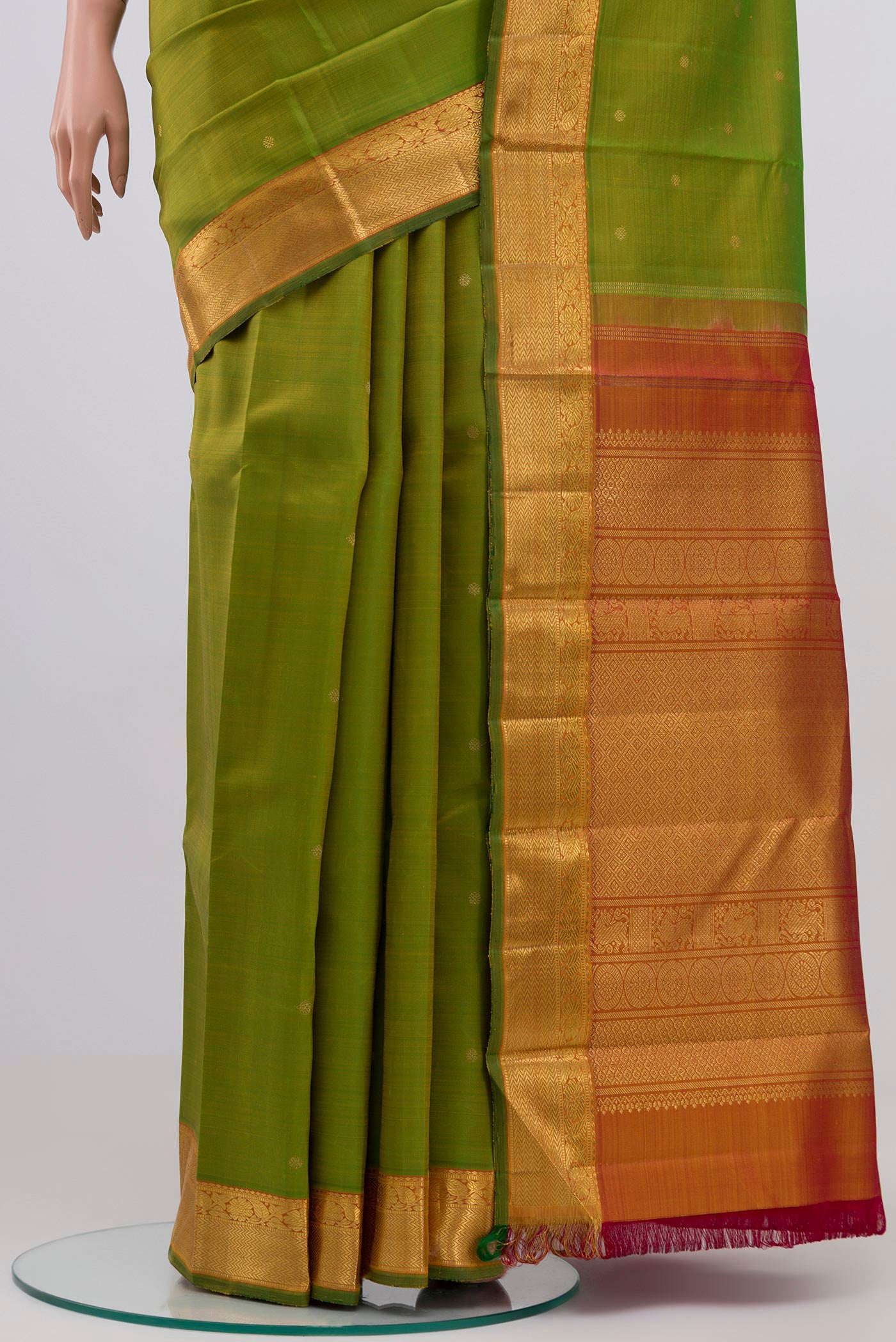 Pleats and pallu of Pure Silk Pure Zari Light Green Kanjivaram Saree with Zari Butta on the body and Zari Border. 