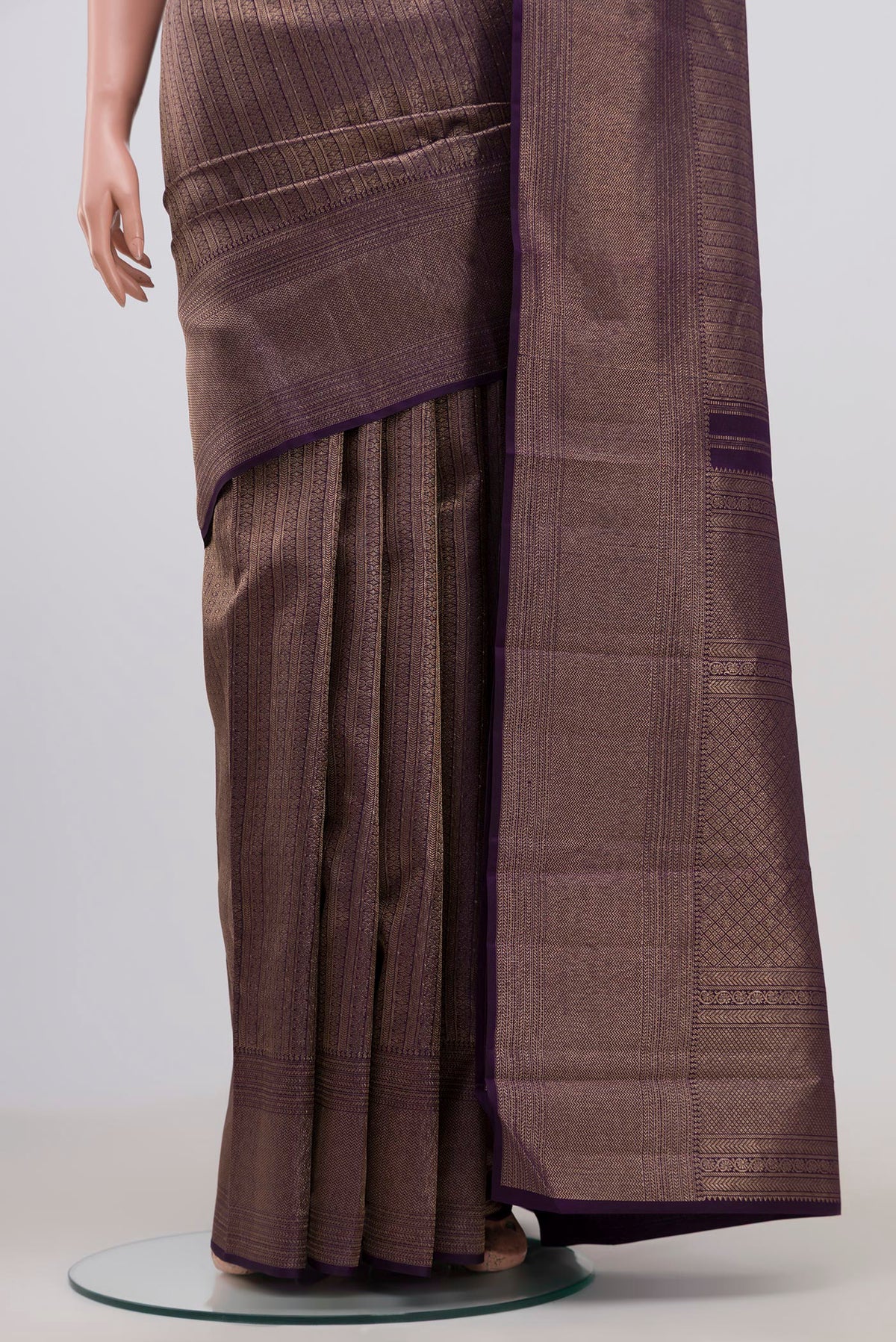 Pleats and pallu of Violet Kanchipuram Saree with Zari Brocade on the body and Zari Border. 