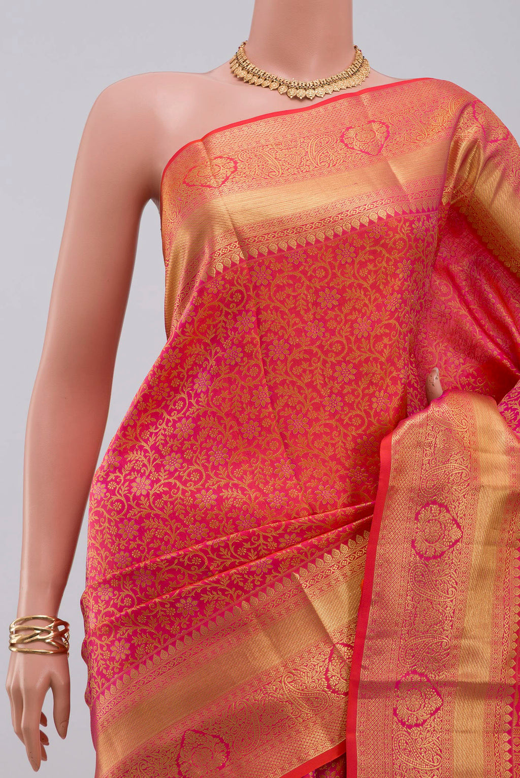 Border image of Orange Kanjivaram Silk Saree with Zari Brocade on the body and Zari Border. 