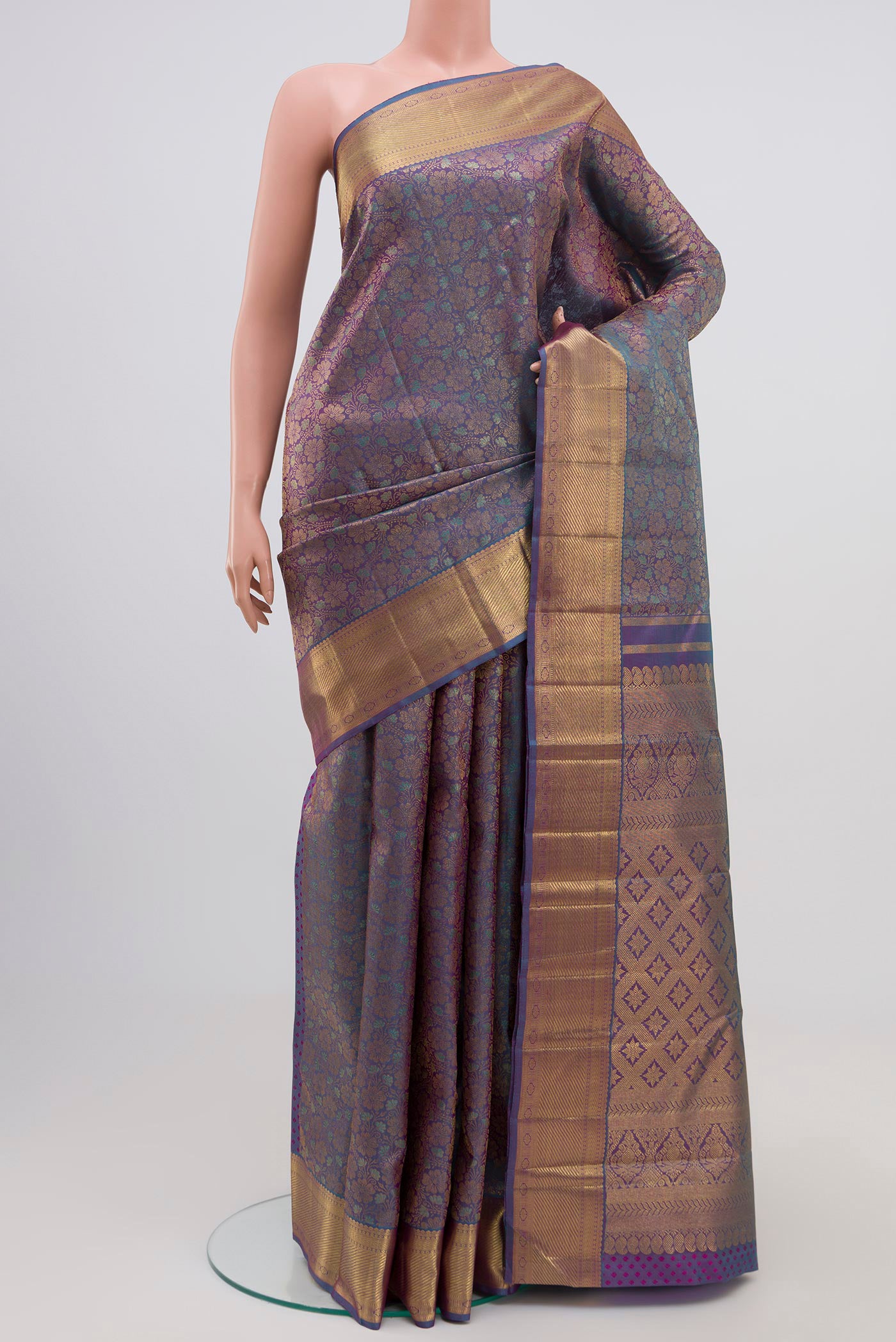 Pure Silk Pure Zari Blue Dual Tone Kanchipuram Saree with Zari Brocade on the body and Zari Border.  displayed on a mannequin