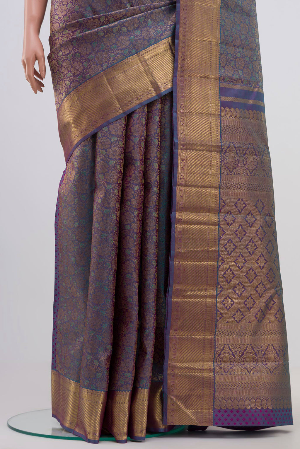 Pleats and pallu of Pure Silk Pure Zari Blue Dual Tone Kanchipuram Saree with Zari Brocade on the body and Zari Border. 