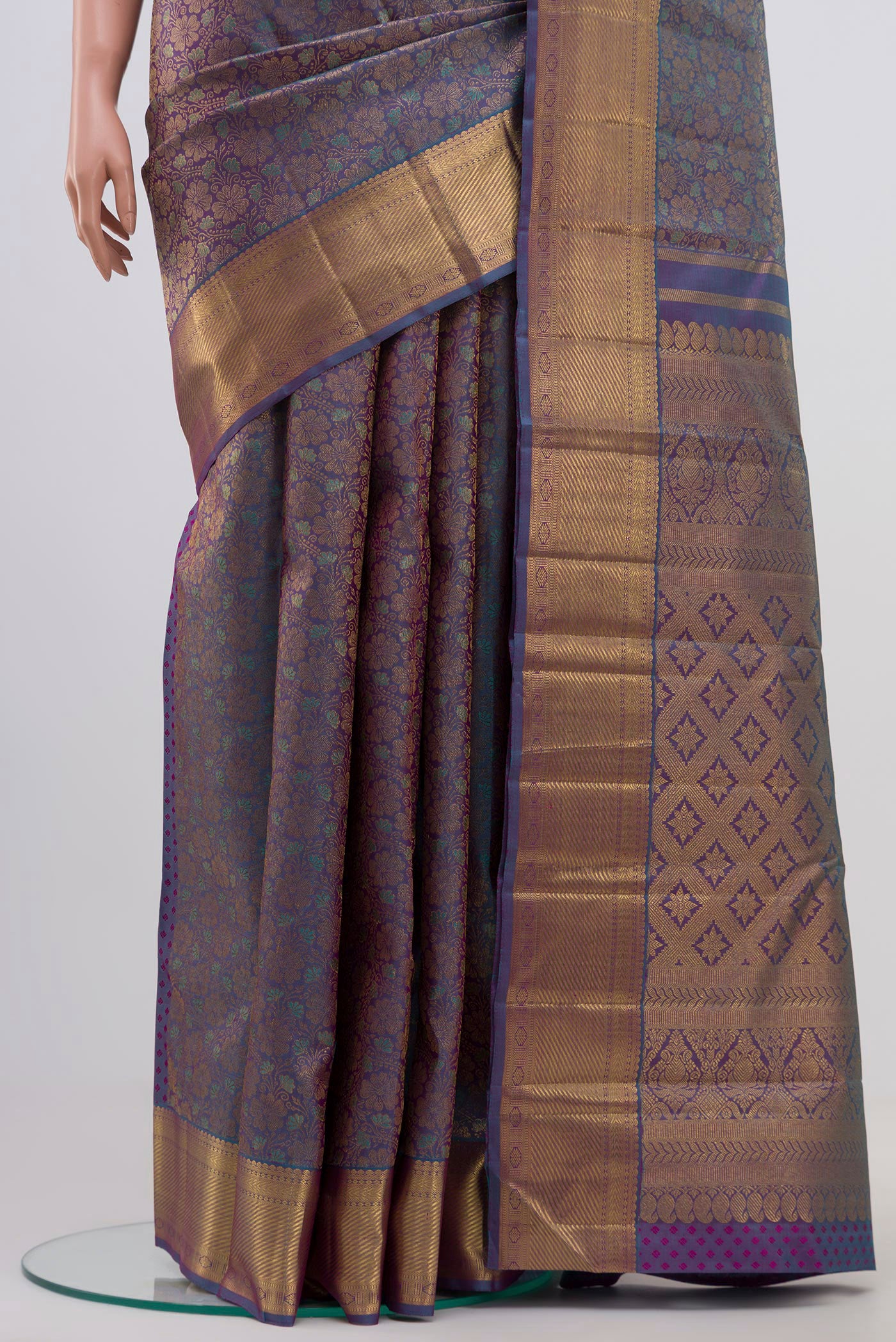 Pleats and pallu of Pure Silk Pure Zari Blue Dual Tone Kanchipuram Saree with Zari Brocade on the body and Zari Border. 