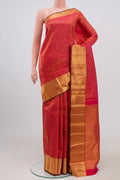 Pure Silk Pure Zari Pink Kanjivaram Saree with Zari Brocade on the body and Zari Border.  displayed on a mannequin