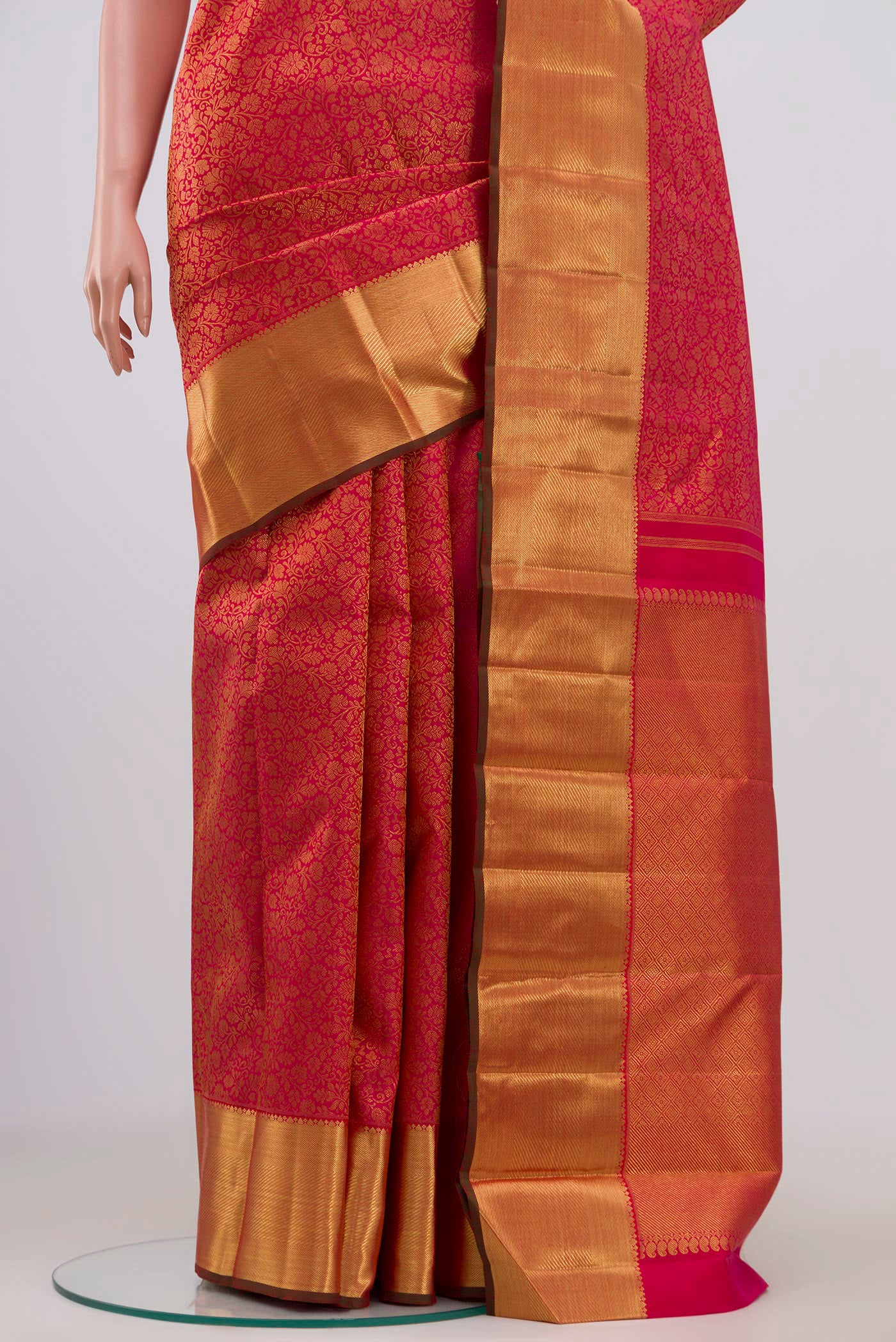 Pleats and pallu of Pure Silk Pure Zari Pink Kanjivaram Saree with Zari Brocade on the body and Zari Border. 