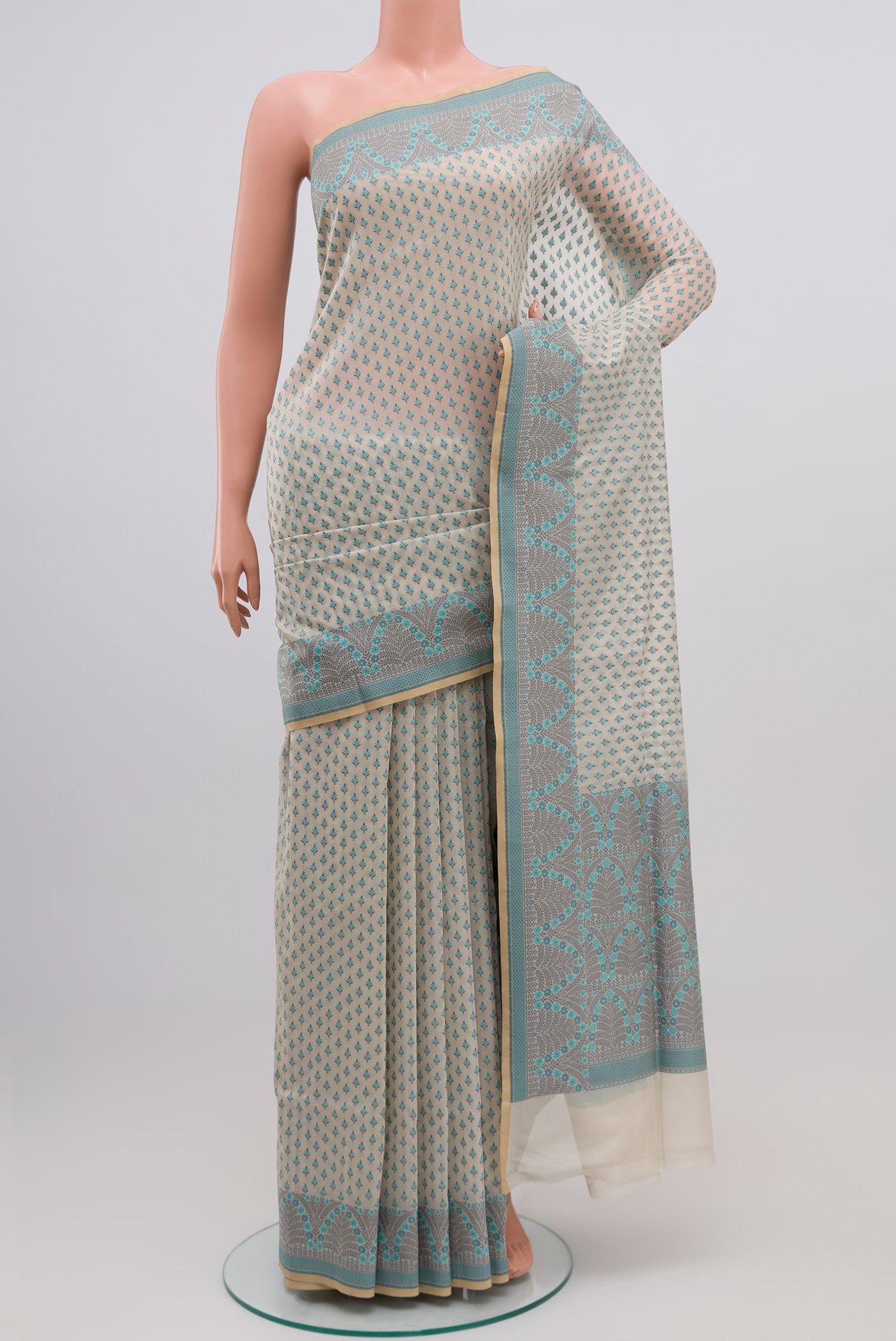 White Banarasi Silk Saree with Thread Butta on the body and Thread Border.  displayed on a mannequin