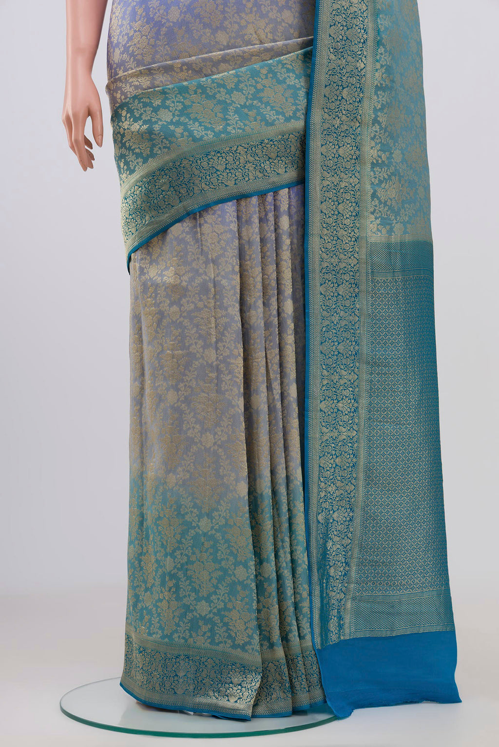 Pleats and pallu of Multi Color Georgette Saree with Fancy on the body and Zari Border. 