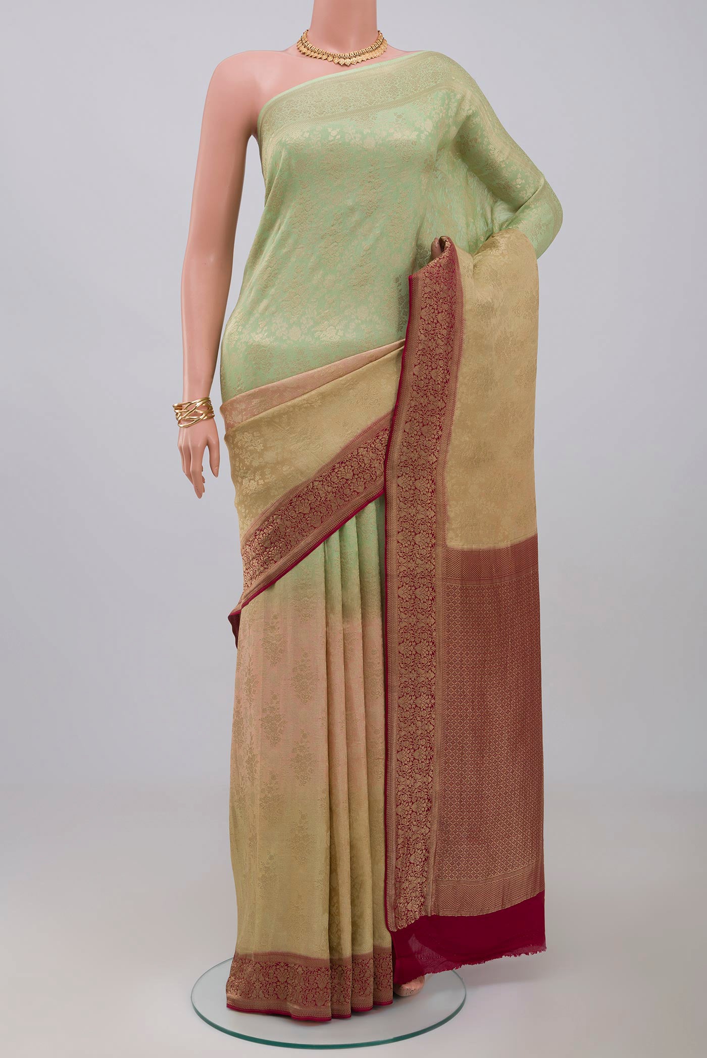 Multi Color Banarasi Georgette Saree with Fancy on the body and Zari Border.  displayed on a mannequin