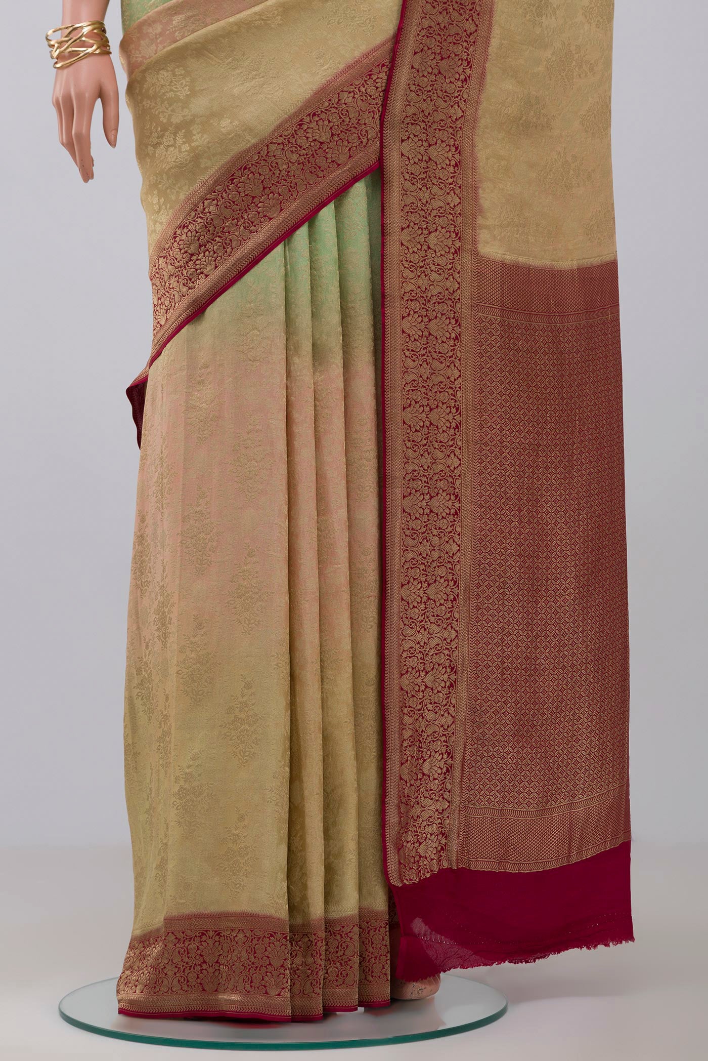 Pleats and pallu of Multi Color Banarasi Georgette Saree with Fancy on the body and Zari Border. 