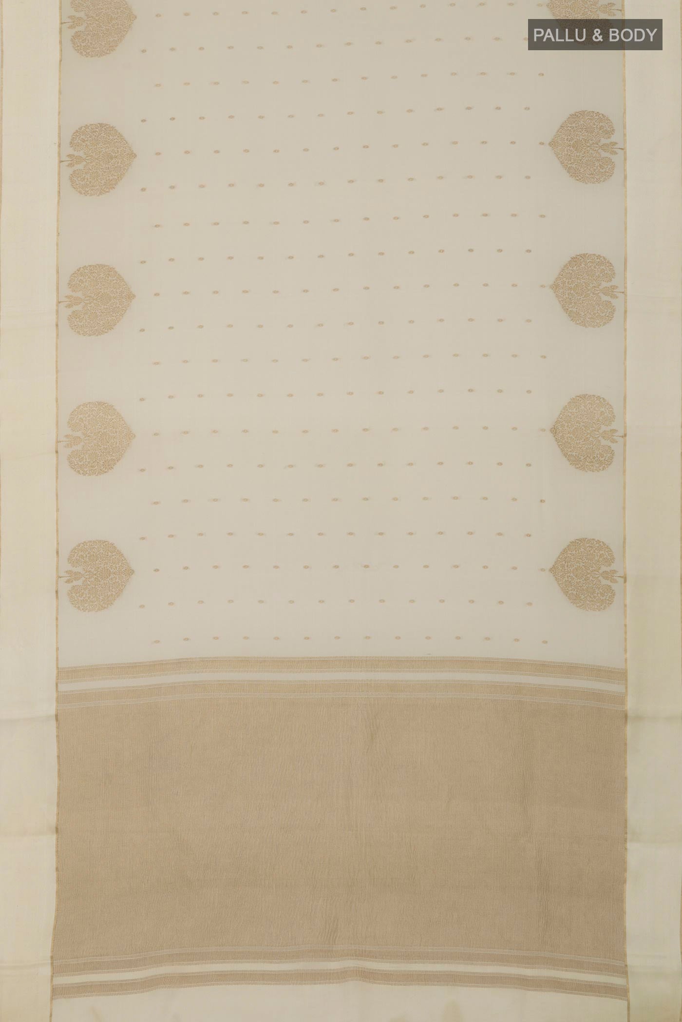 Flat view of Cream Crepe Saree with Zari Butta on the body and Thin Zari Line. 