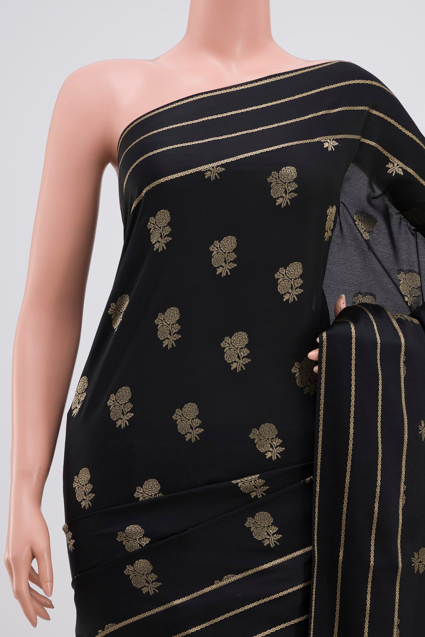 Border image of Black Mysore Crepe Saree with Zari Butta on the body and Thin Zari Line. 