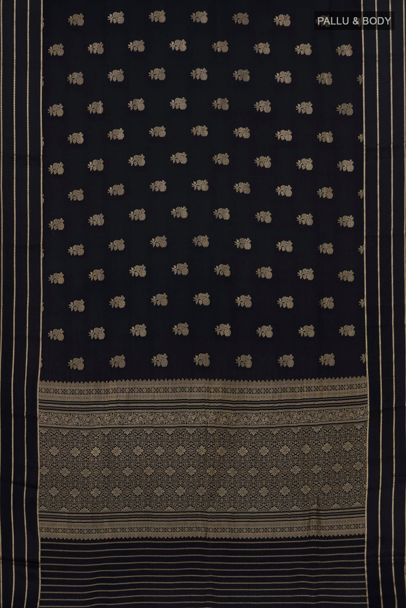 Flat view of Black Mysore Crepe Saree with Zari Butta on the body and Thin Zari Line. 