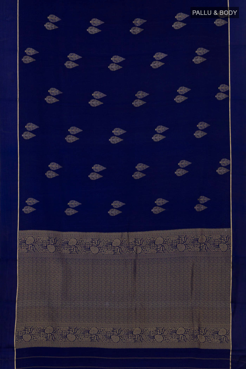 Flat view of Navy Blue Mysore Crepe Saree with Zari Butta on the body and Thin Zari Line. 