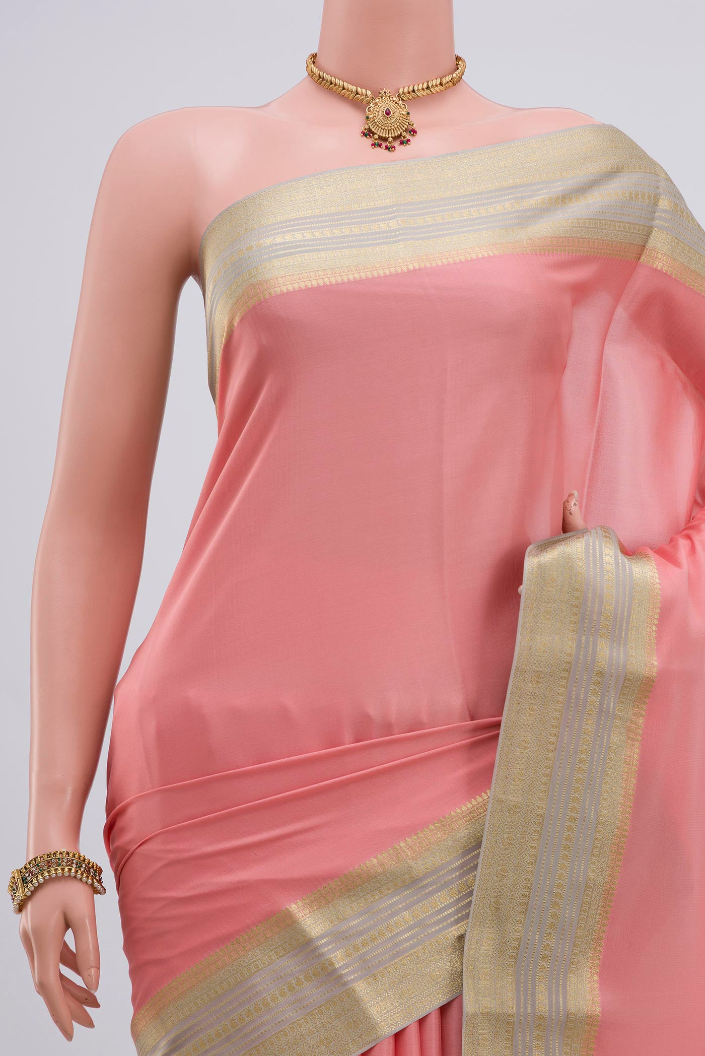 Border image of Pink Crepe Saree with Plain Body and Zari Border. 