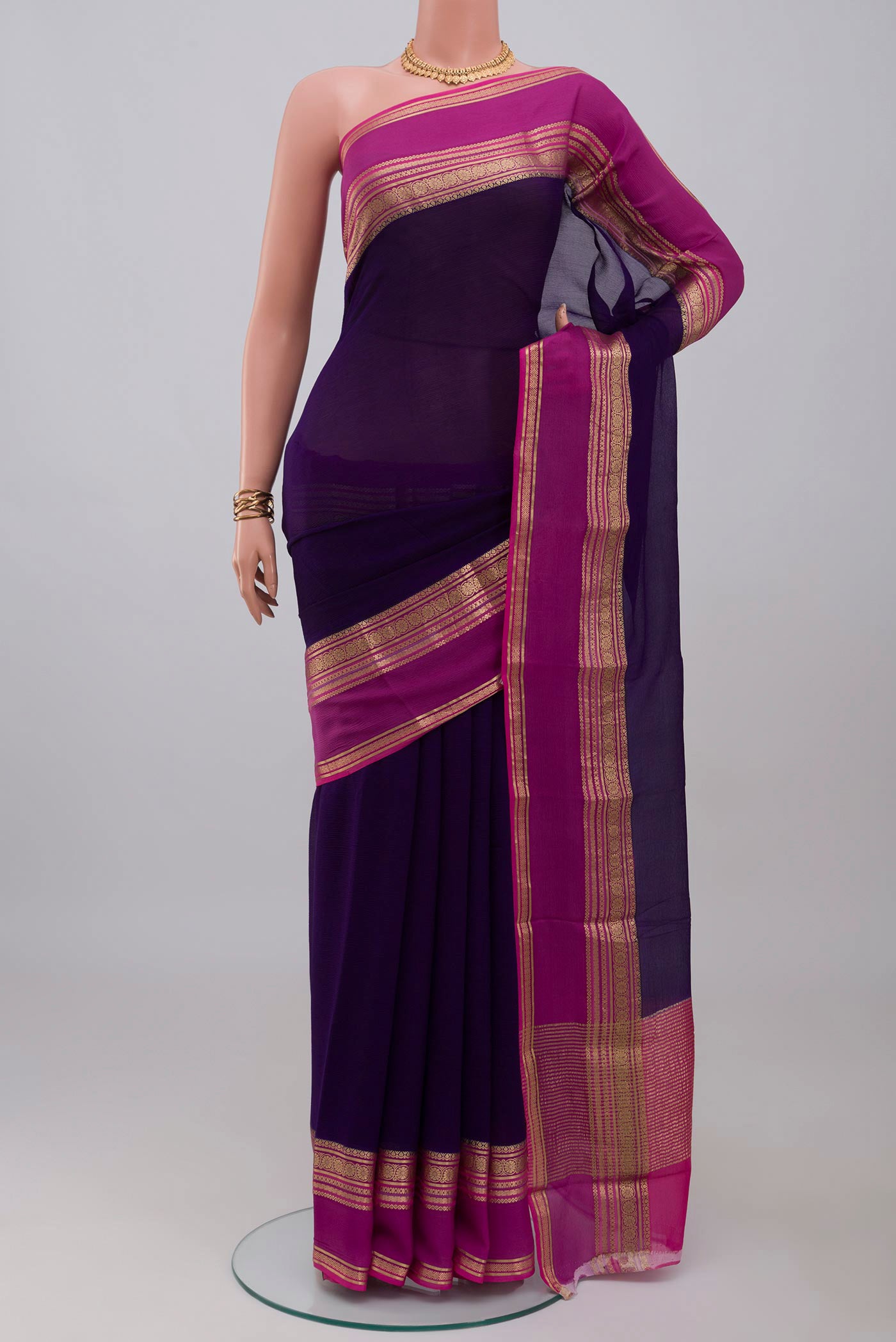 Navy Blue Mysore Chiffon Saree with Plain Body and Zari Border.  displayed on a mannequin