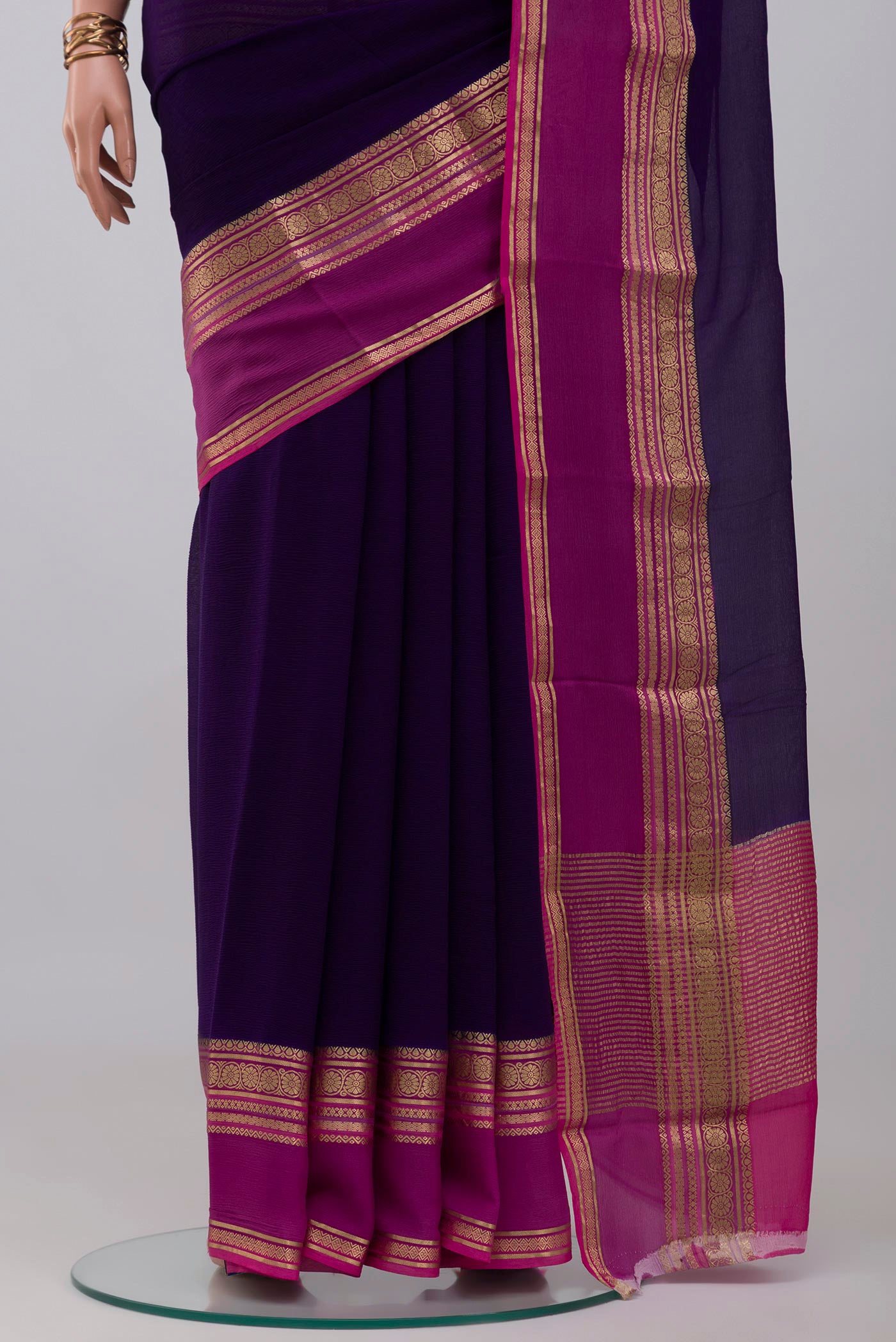 Pleats and pallu of Navy Blue Mysore Chiffon Saree with Plain Body and Zari Border. 