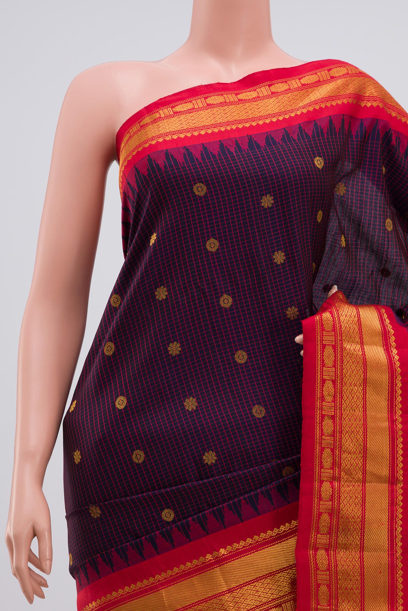 Border image of Blue Gadwal Silk Saree with Zari Butta on the body and Zari Border. 
