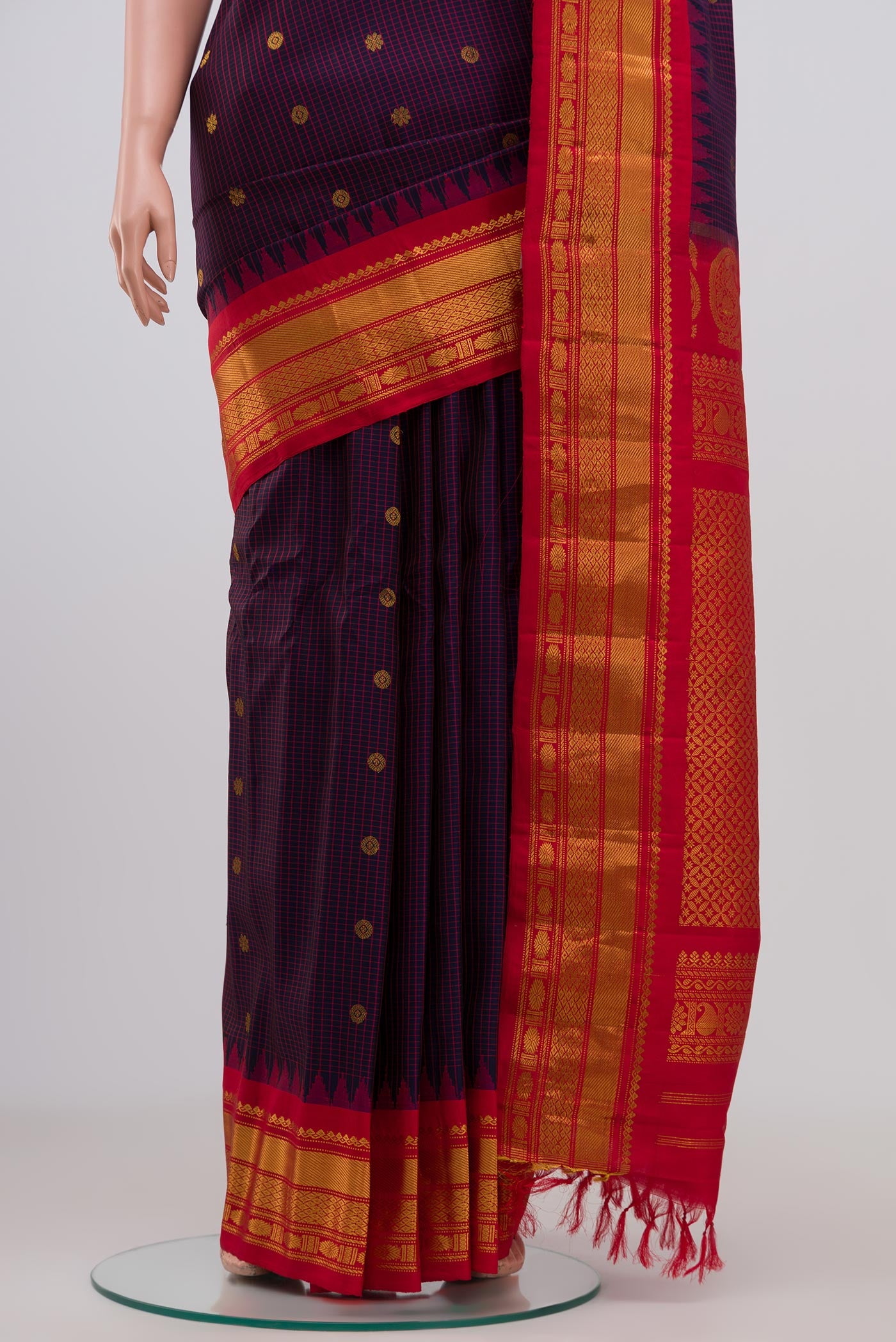 Pleats and pallu of Blue Gadwal Silk Saree with Zari Butta on the body and Zari Border. 