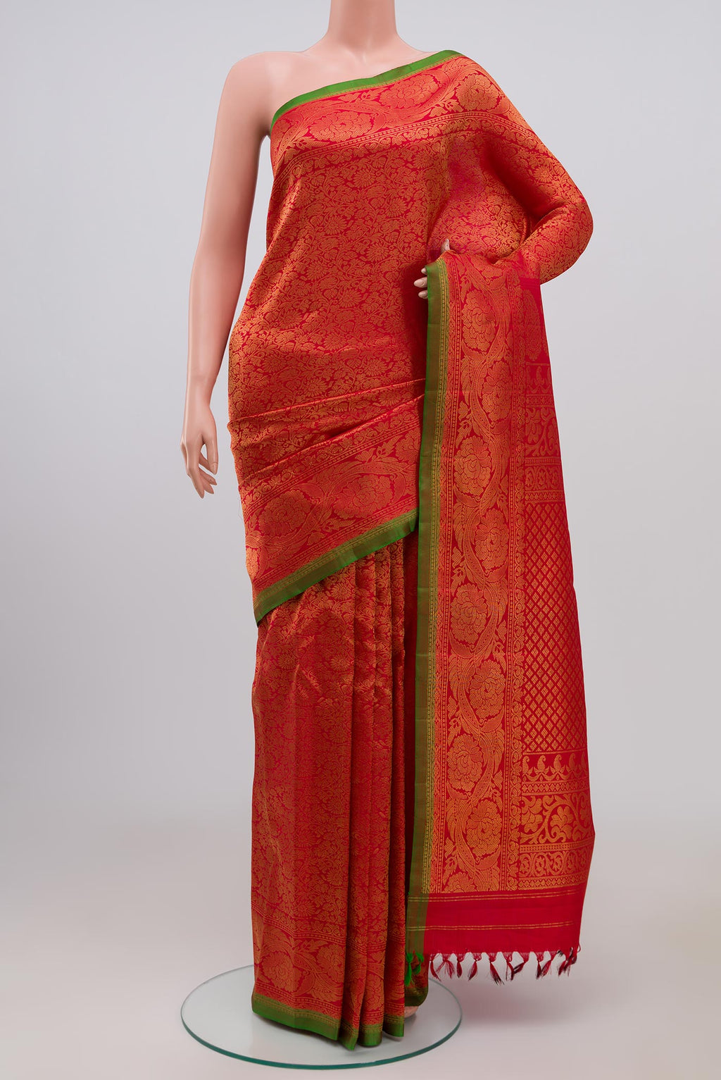 Red Gadwal Silk Saree with Zari Brocade on the body and Zari Border.  displayed on a mannequin