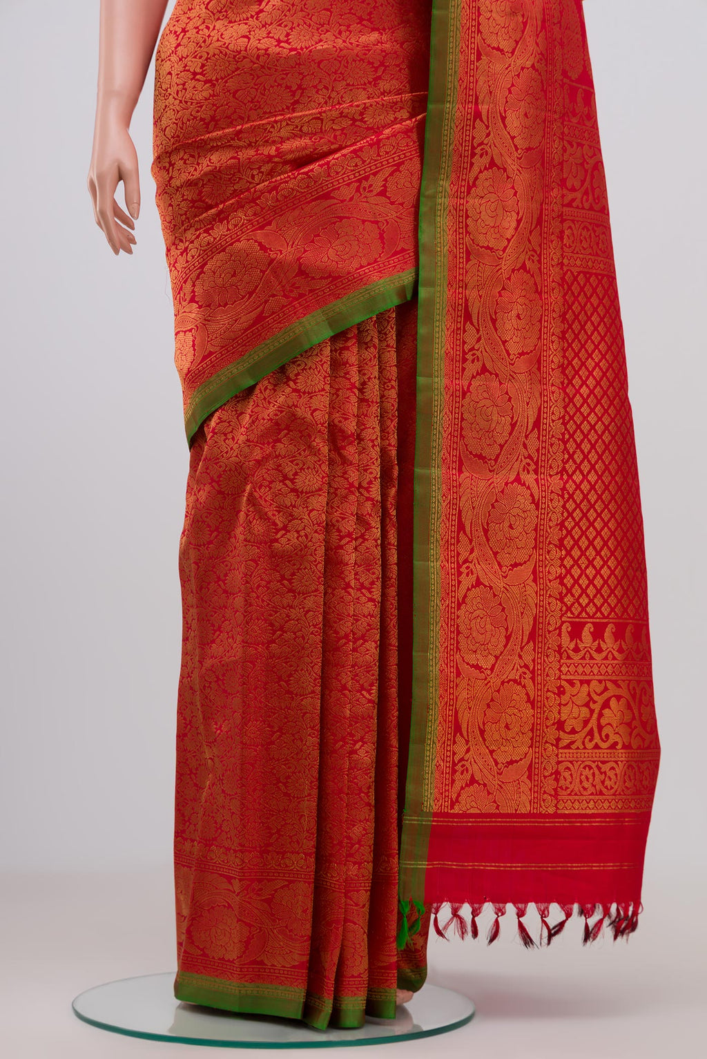 Pleats and pallu of Red Gadwal Silk Saree with Zari Brocade on the body and Zari Border. 