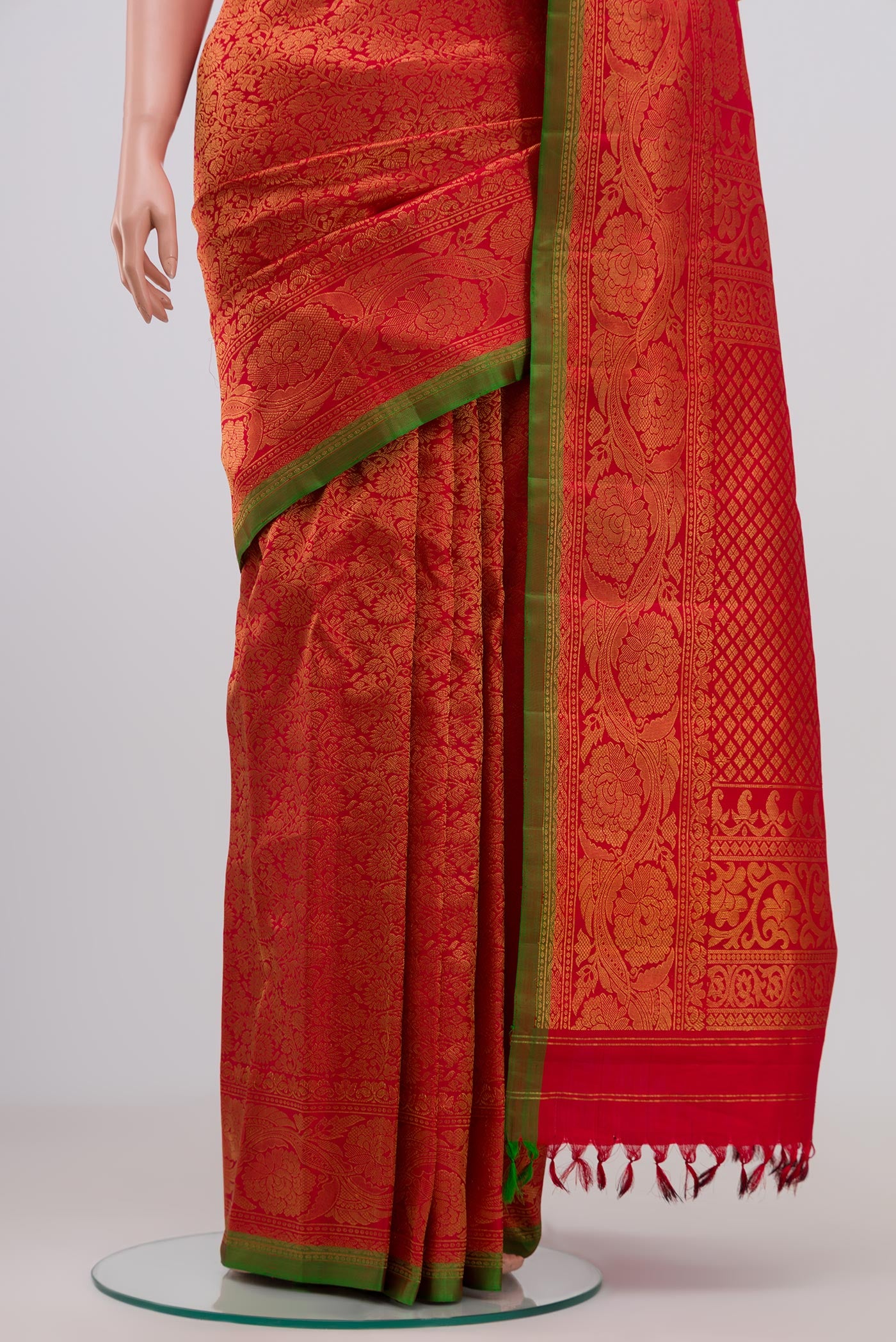 Pleats and pallu of Red Gadwal Silk Saree with Zari Brocade on the body and Zari Border. 