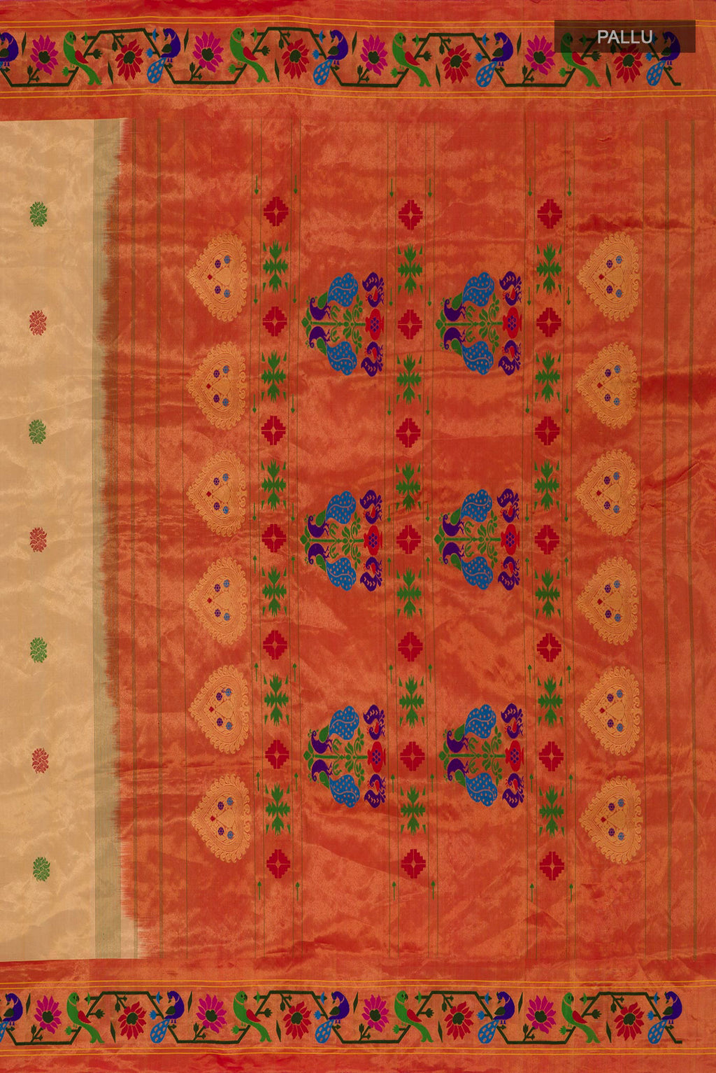 Close up image of the pallu of Sandal Paithani Silk Saree with Thread Butta on the body and Paithani Border. 