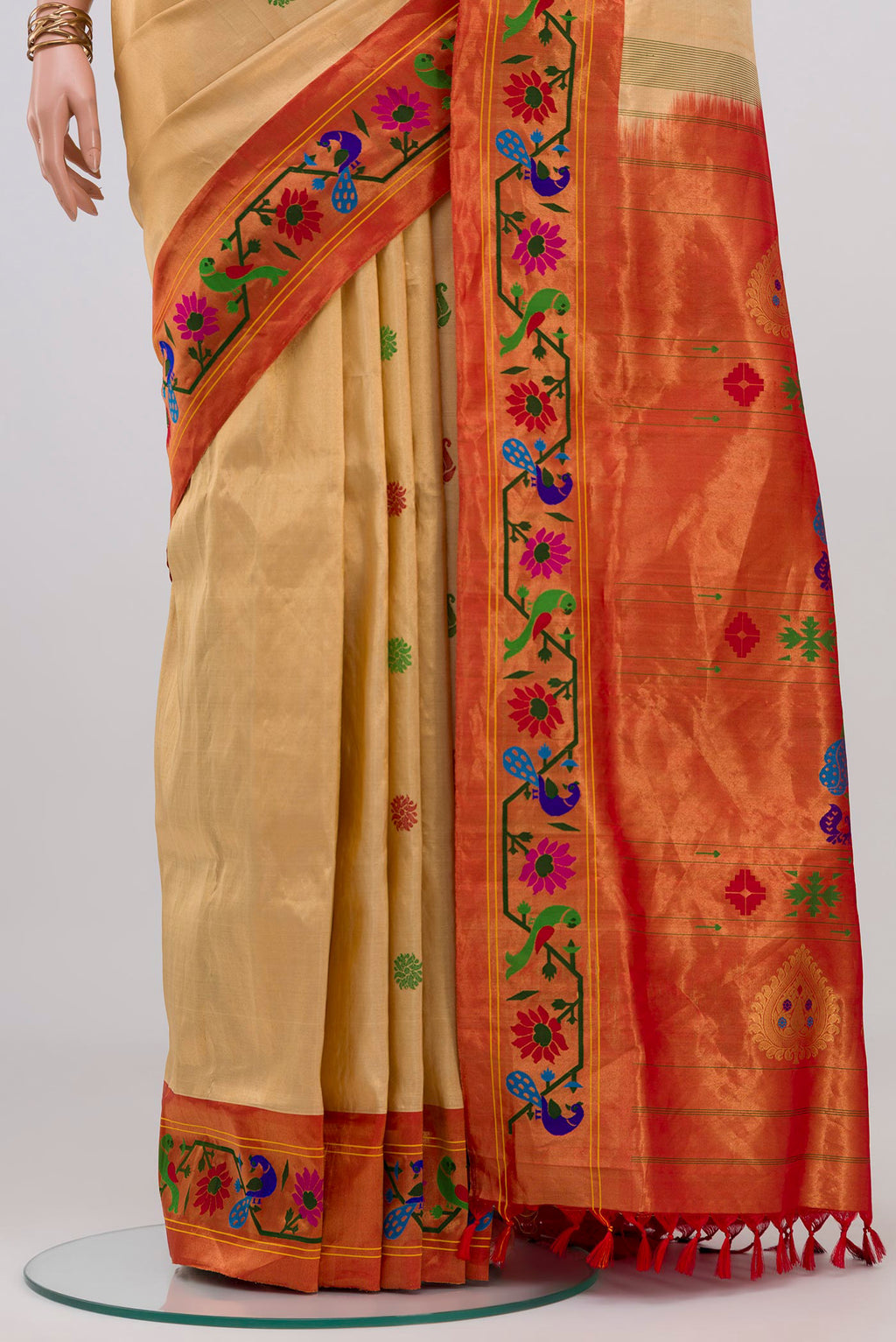 Pleats and pallu of Sandal Paithani Silk Saree with Thread Butta on the body and Paithani Border. 