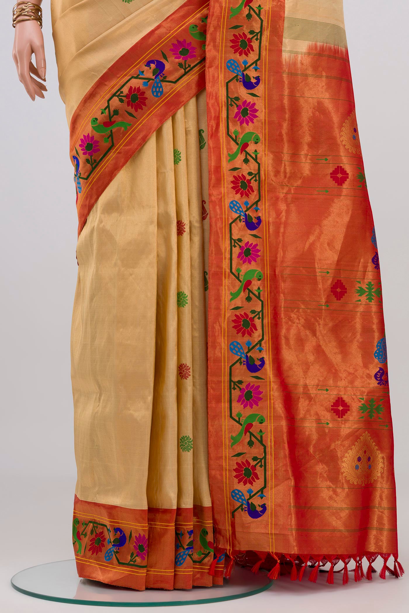 Pleats and pallu of Sandal Paithani Silk Saree with Thread Butta on the body and Paithani Border. 